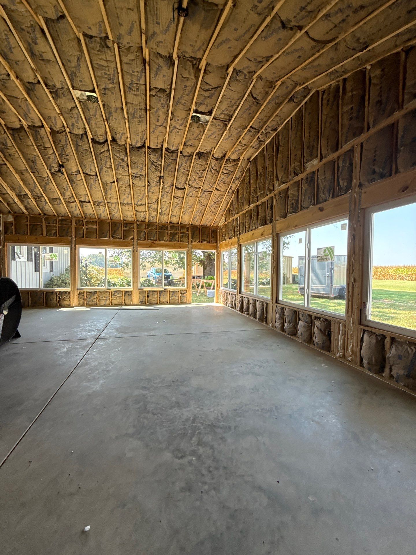 Sunroom and Garage Addition by Skilled Construction LLC