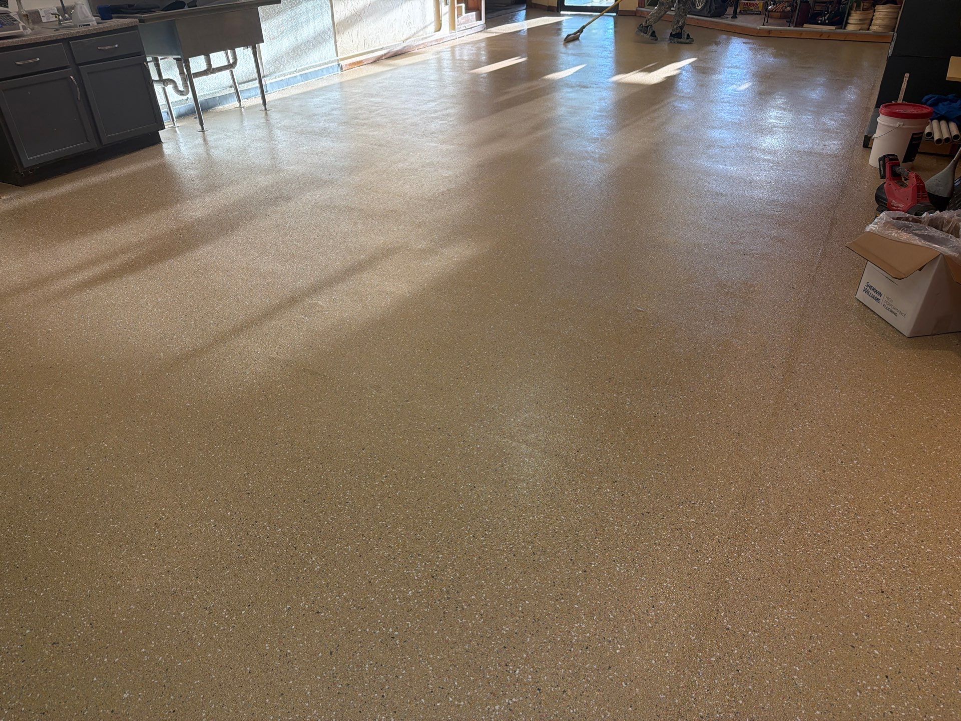 Epoxy Flooring Installation – Downtown Muskegon Commercial Space by Gordon Painting