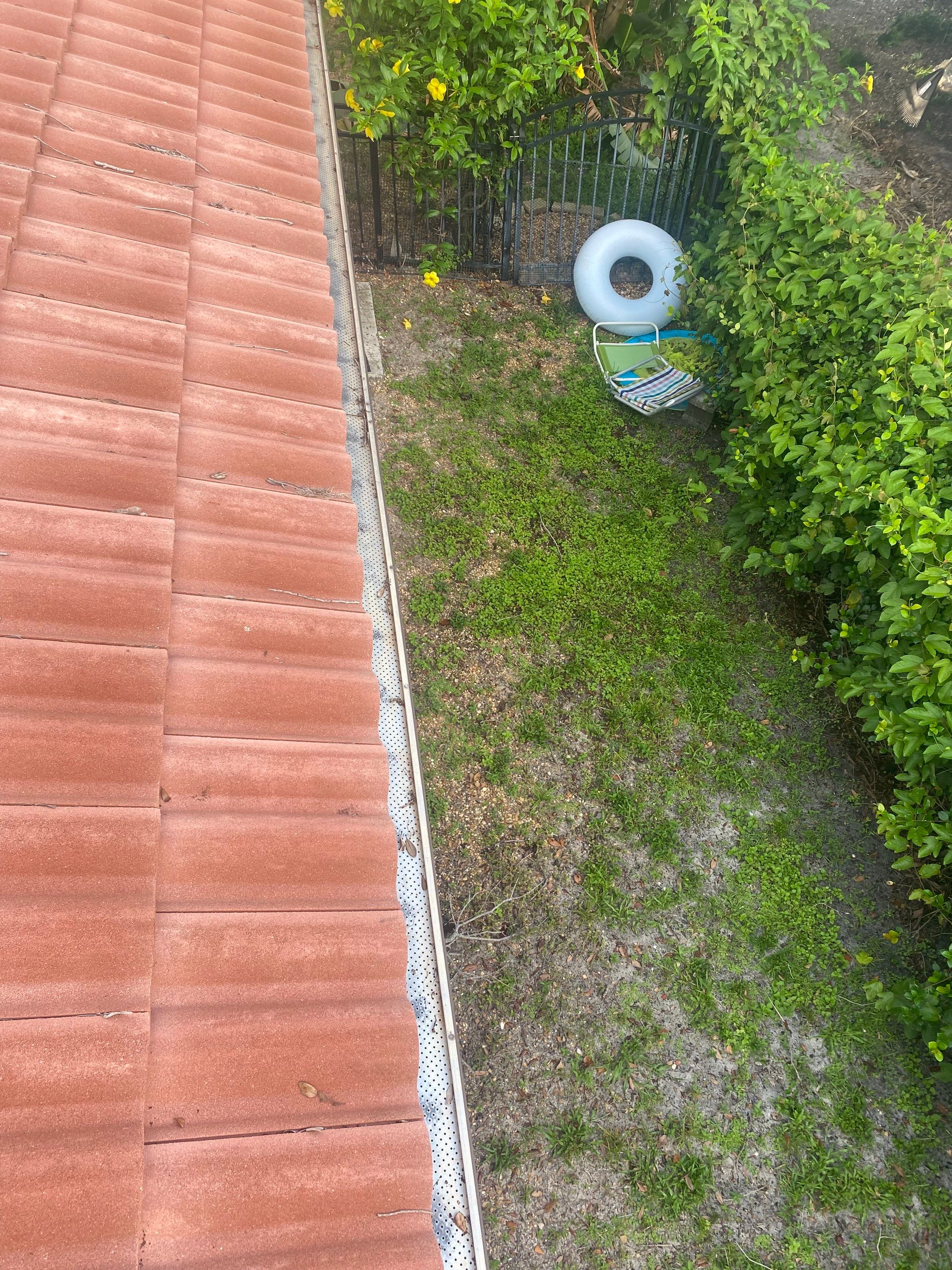 Gutter Guards Installation using gutter cleaning in Sarasota FL by Gutter Professors
