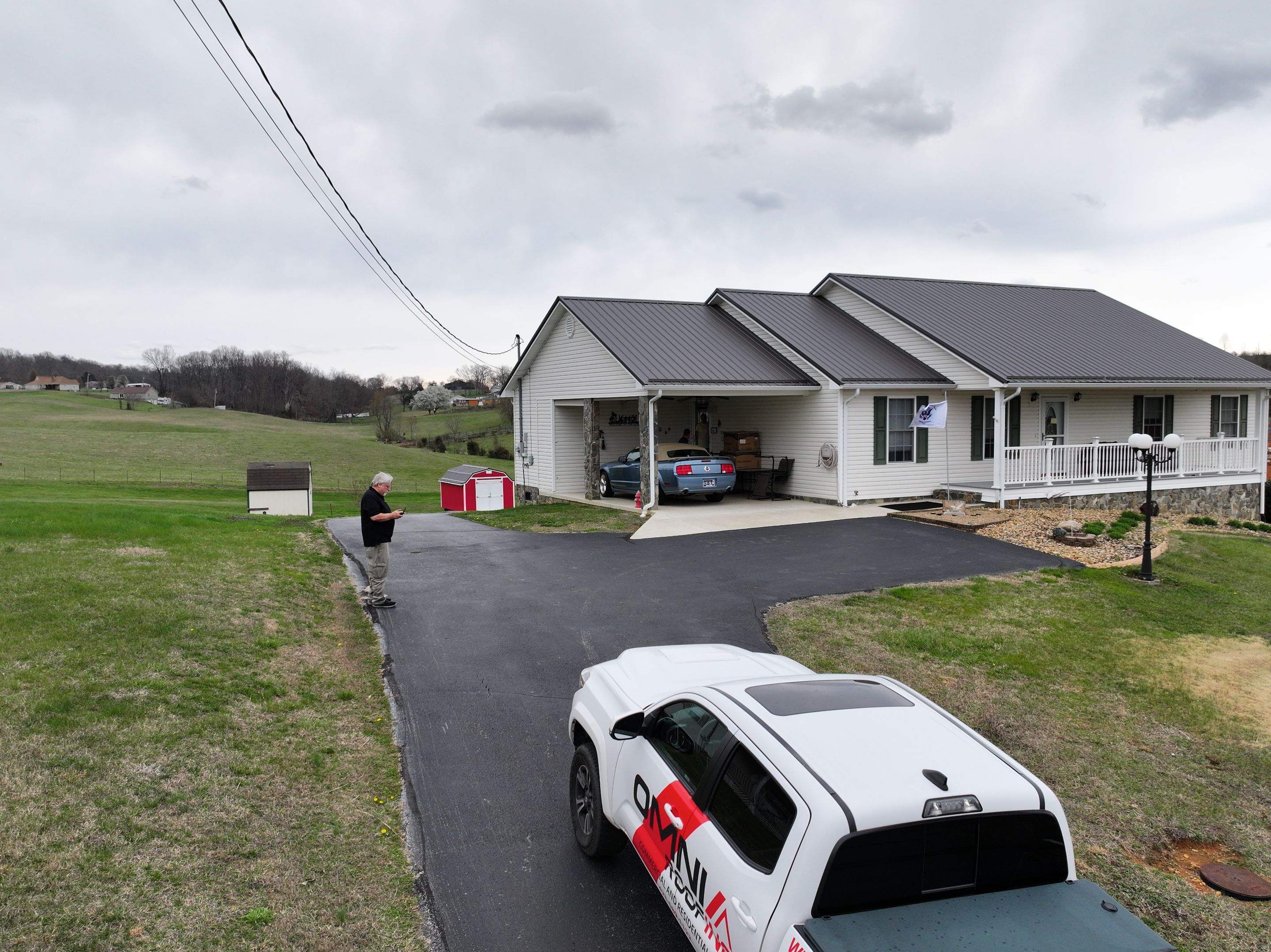 Lutackas Residence by Omnia Roofing