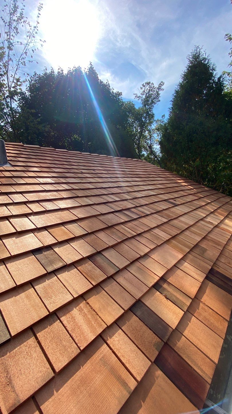 Cedar Shake Roof Replacement by Custom Installations