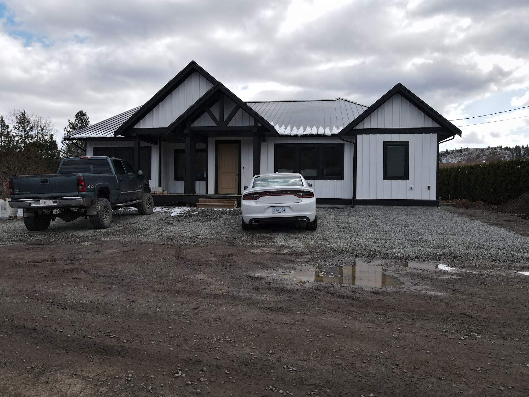 Residential Roofing Installation using 12" Prolok metal  by Top Notch Roofing Inc