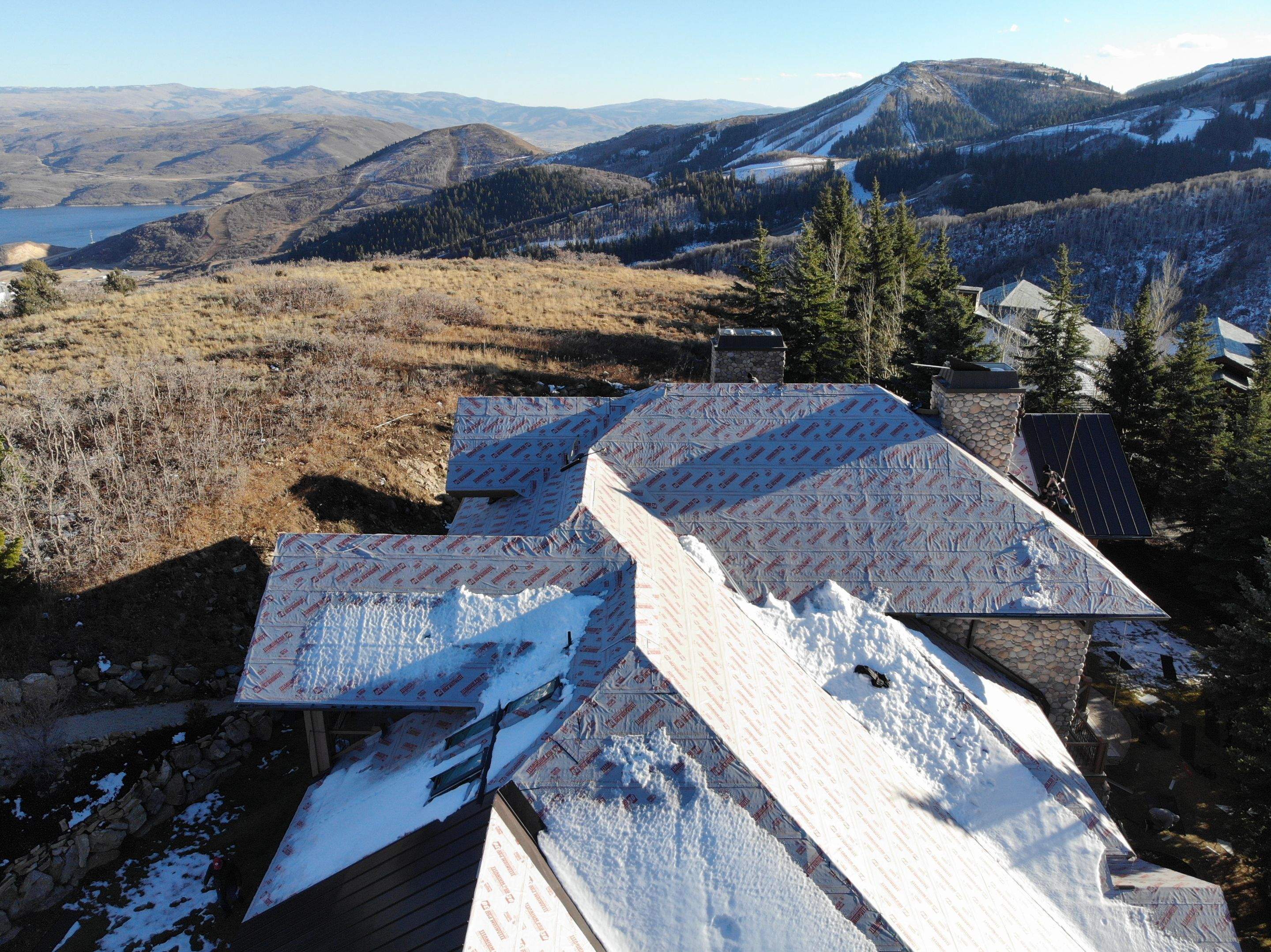 Standing Seam Metal Roof Replacement After Snow Damage by ASAP Roofing & Restoration
