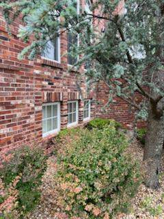 2nd-Story Exterior Trim Paint Repair – Chesterfield, MO by Legendary Services Company LLC.