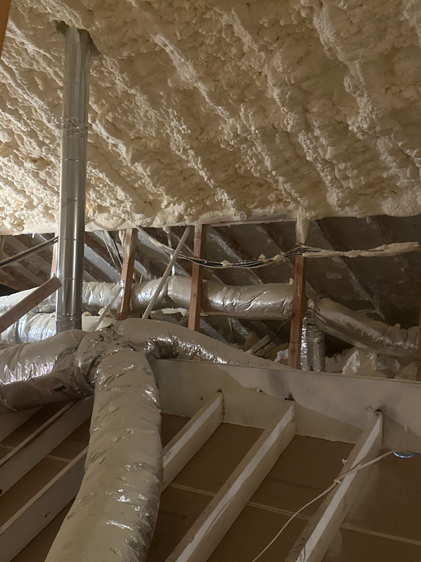 Spray foam insulation removal & re spray by Apex Insulation Solutions