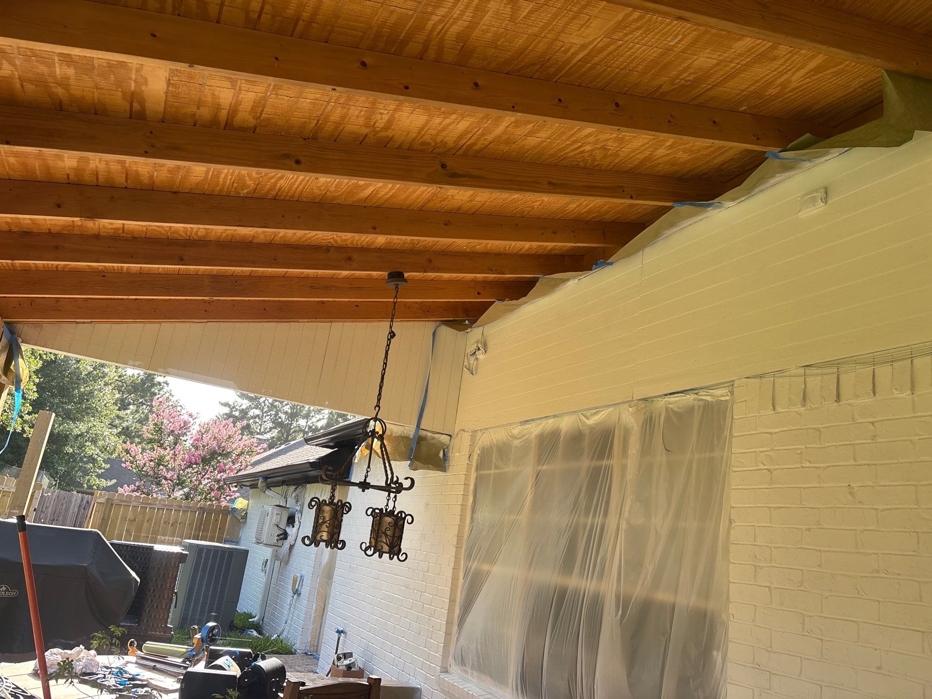 Project in TylerExterior Painting in Tyler, TX | White Brick Home, Varnished Fence & Shed Painting by Quality Coats Painting