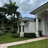 24ga 1.5" Mechanical Seam Dark Bronze by Total Roofing System The Metal Roof Experts