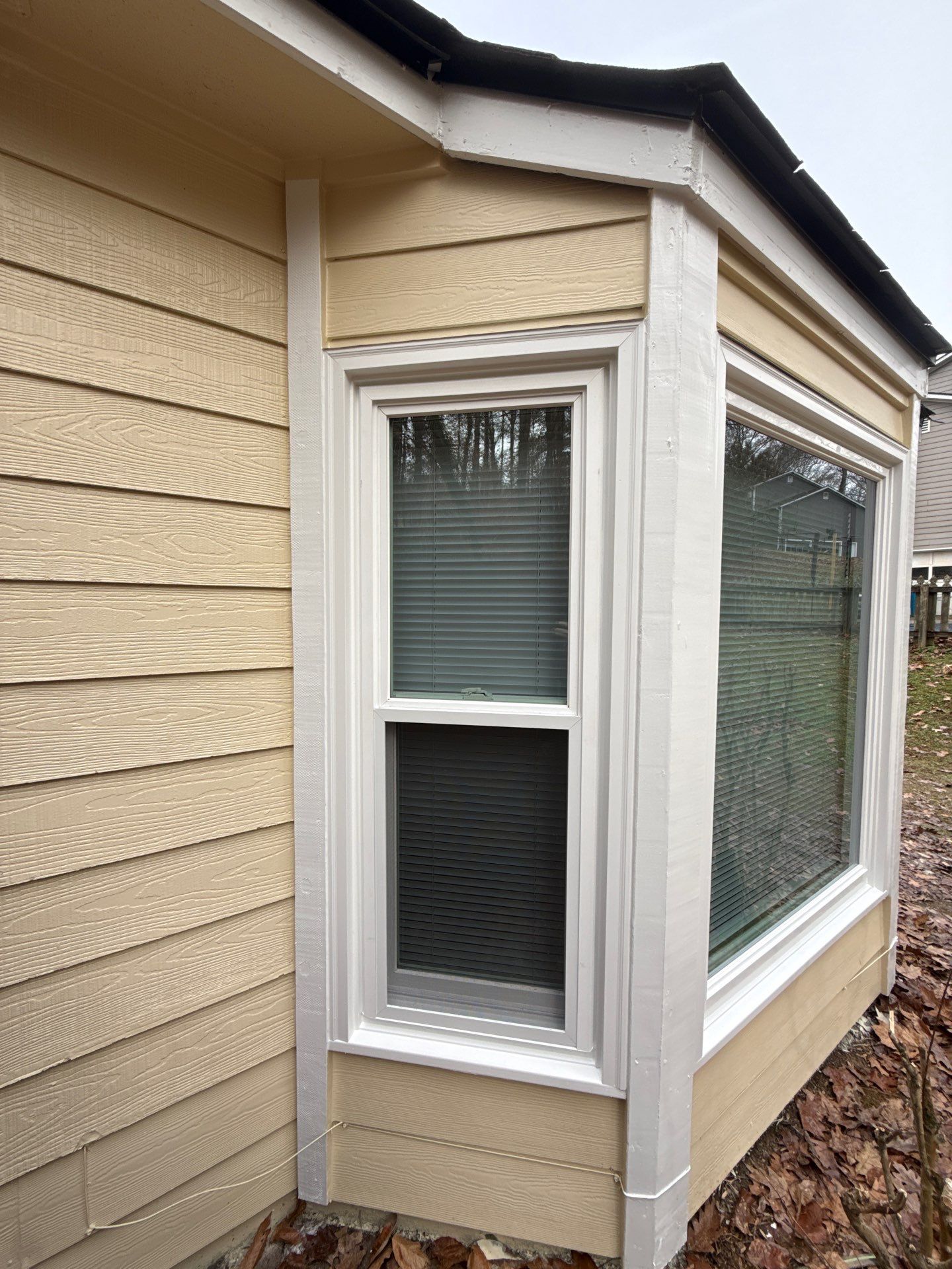 Norcross Exterior Remodel With New Lap Siding and Window Installation by Swift Home Renovations