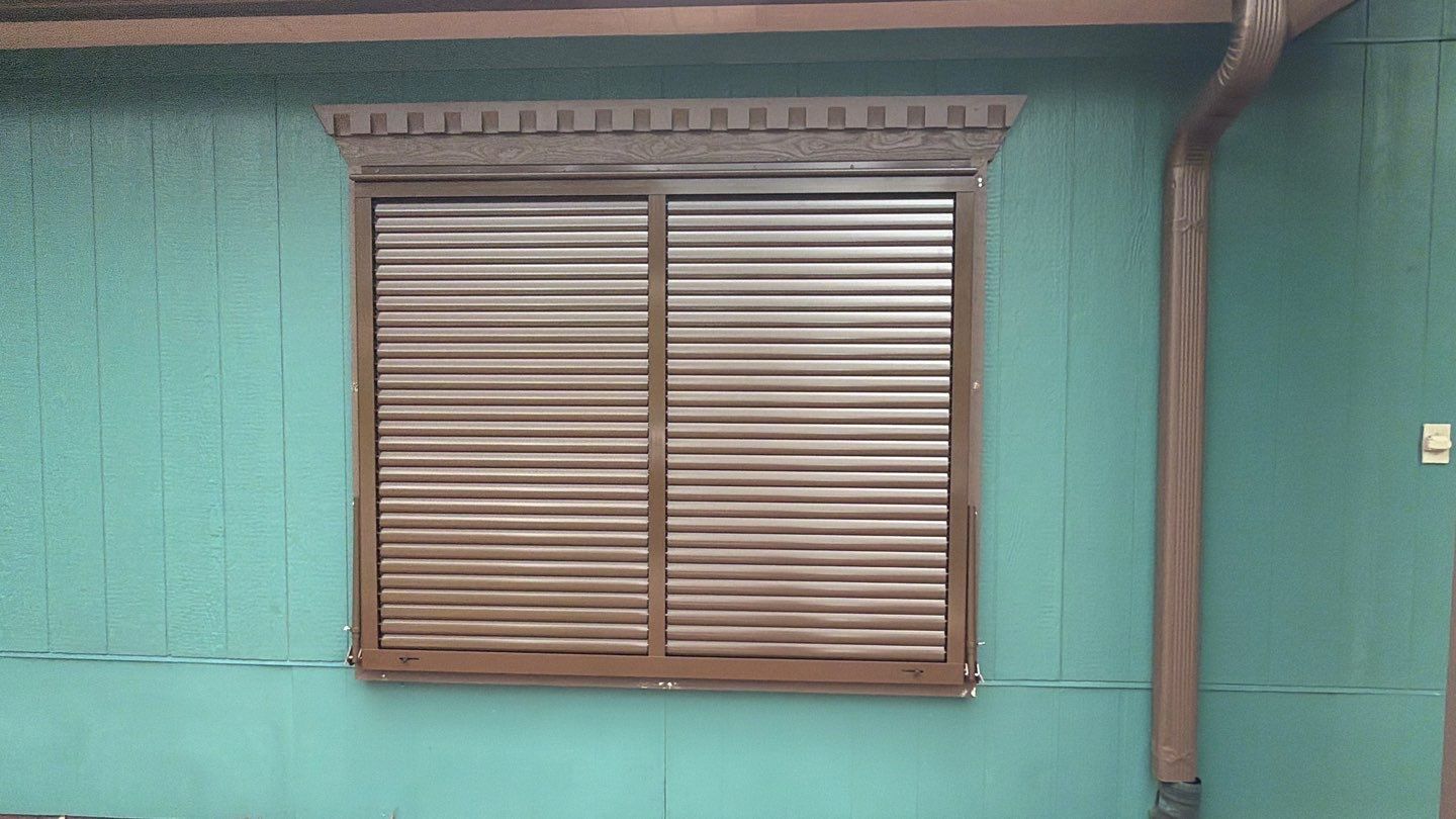 Bahama Shutter (RAL 8014 Sepia Brown) by Smart Guard Shutters