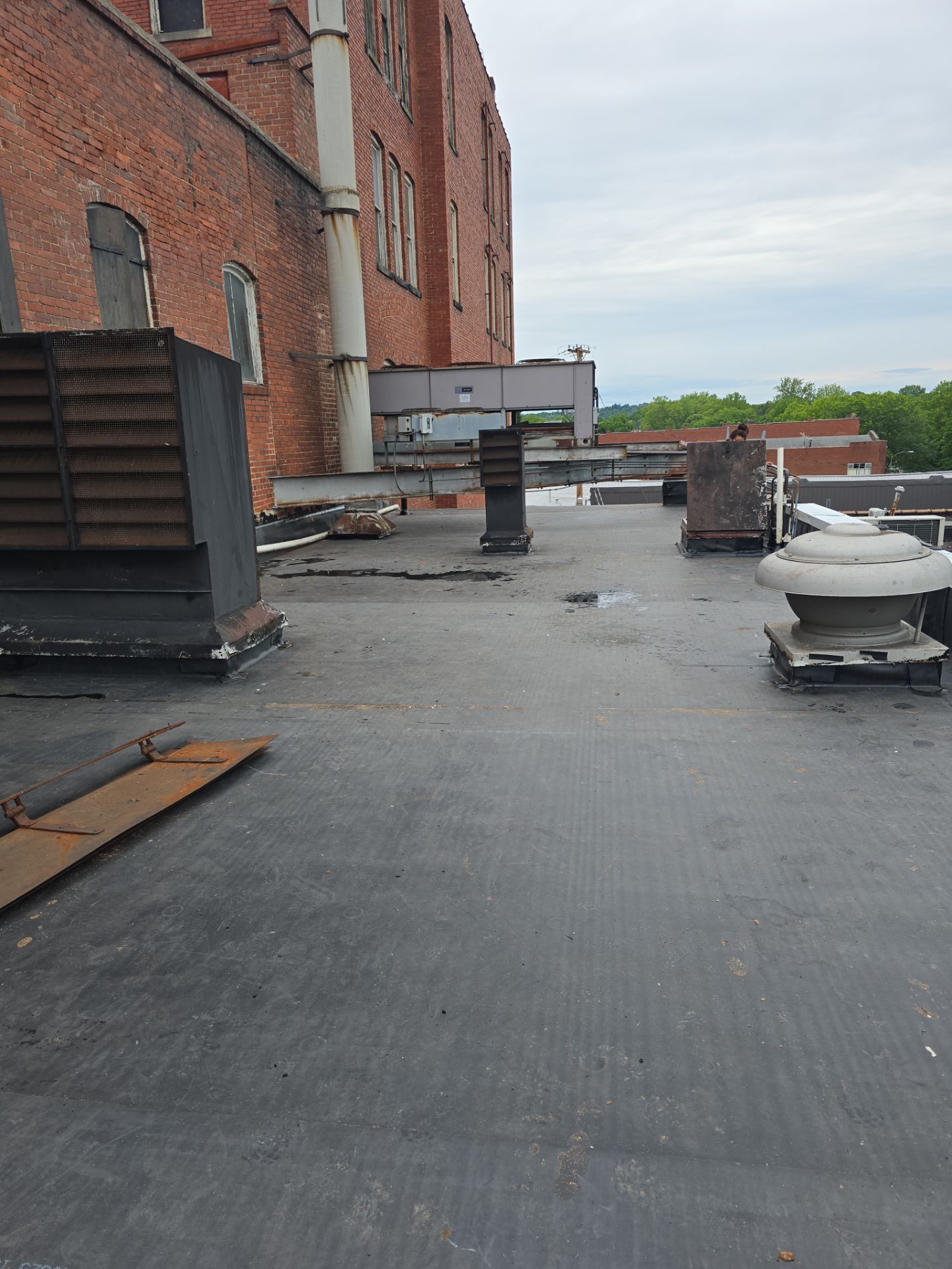 Commercial Roofing Installation using EPDM  by Rainstoppers Roofing