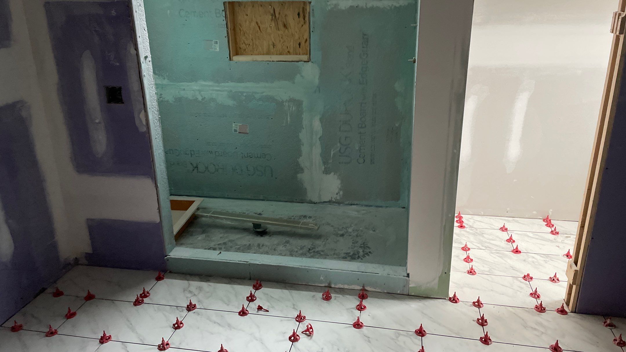 Remodeled Home with new tile floors, Showers and Refinished Oak Floors with stain and Waterbased Finish by Footprints Floors of Coastal Carolina