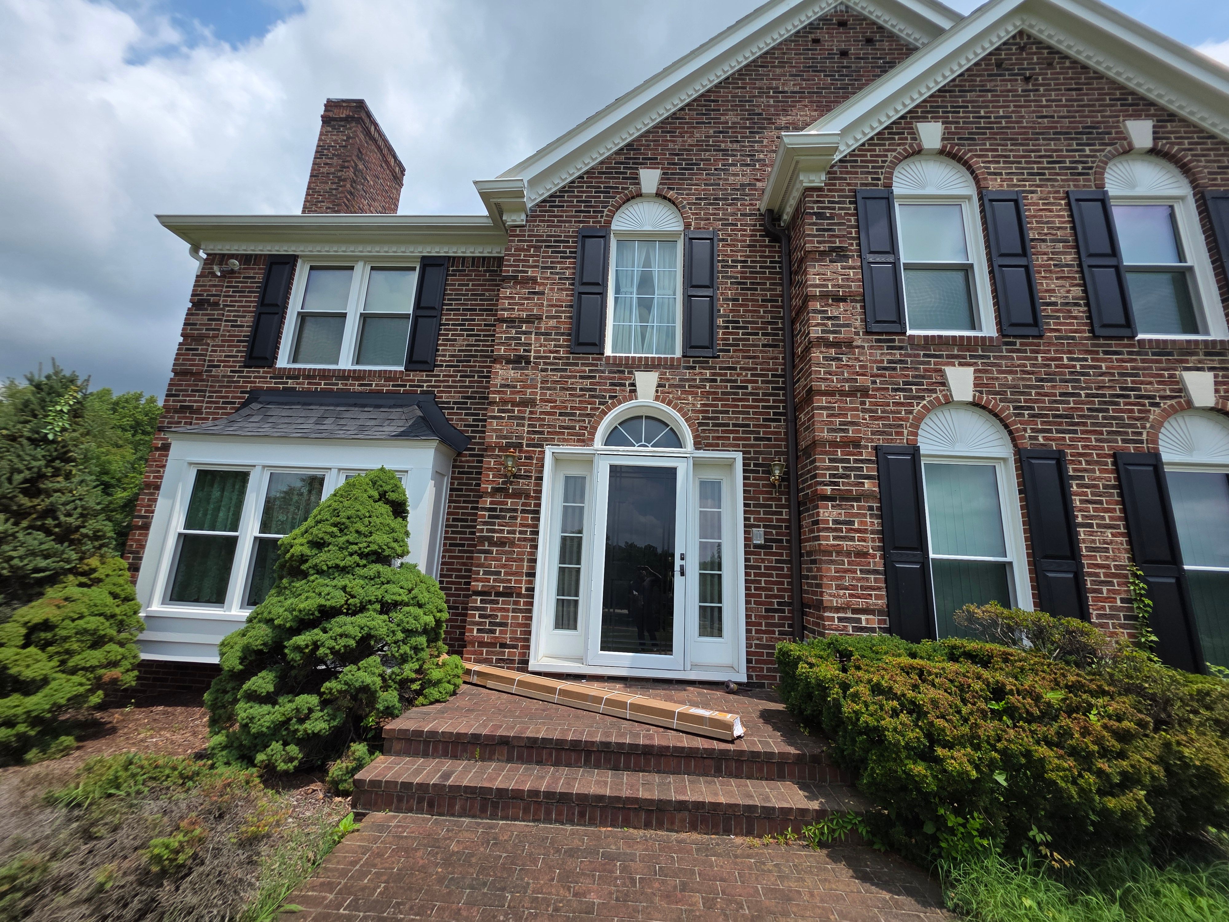Vinyl Window Replacement for Two-Story Brick Home in Upper Marlboro by Window Depot of Annapolis