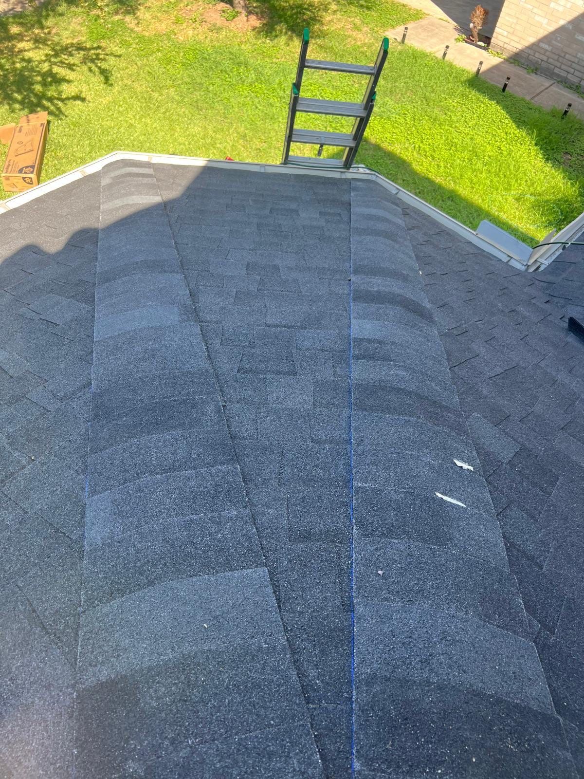 Residential Roofing Installation using Tamko Heritage® Series Rustic Black by CAP Roofing and Construction LLC