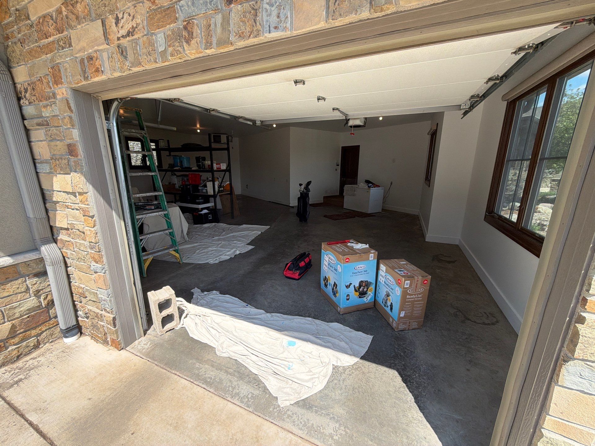 Feather Grey Floor Coating in Sioux Falls, SD by Select Painting, Coatings & Garage Cabinets