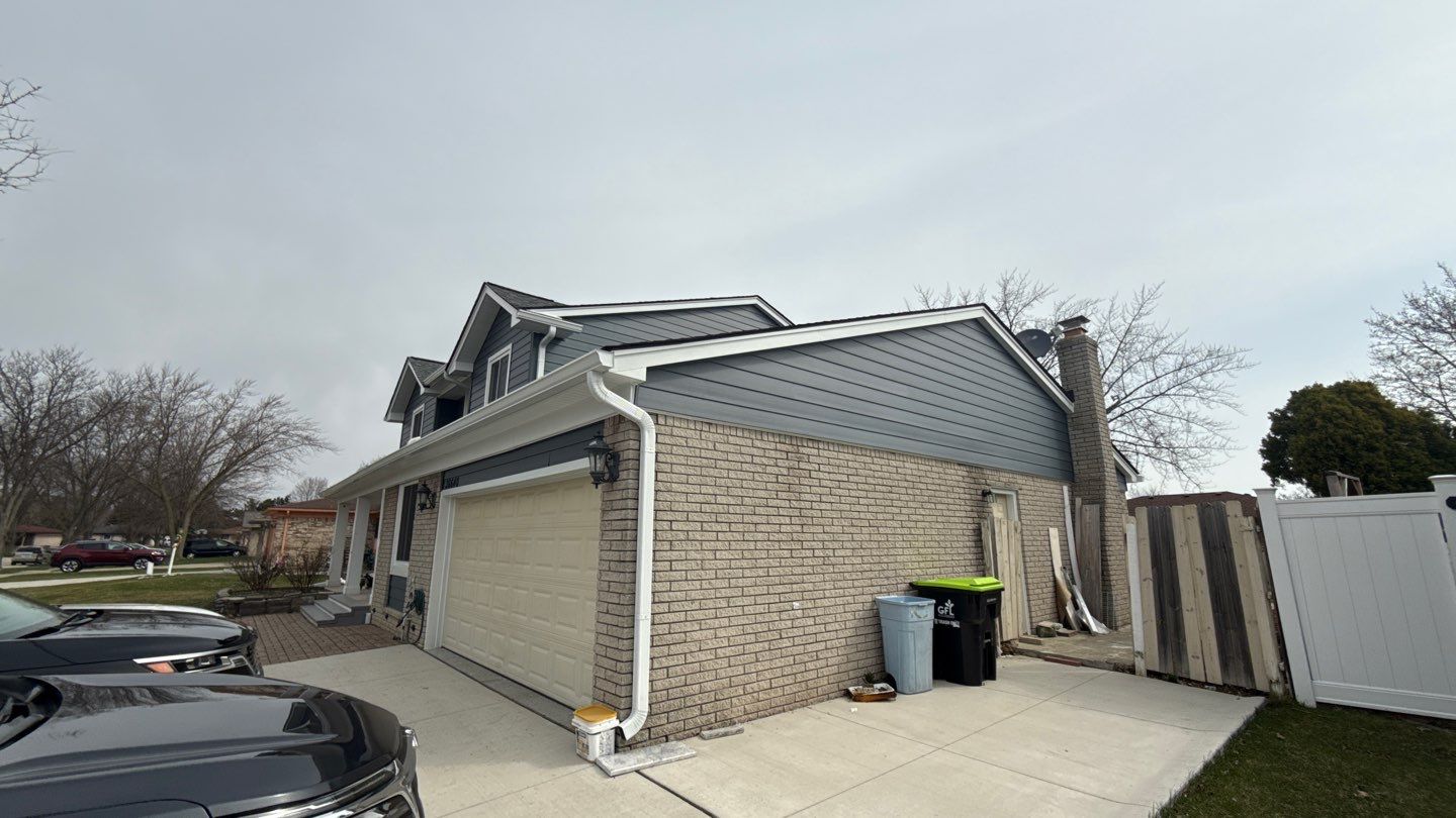 Siding Replacement using Alside Midnight Blue by 180 Contractors