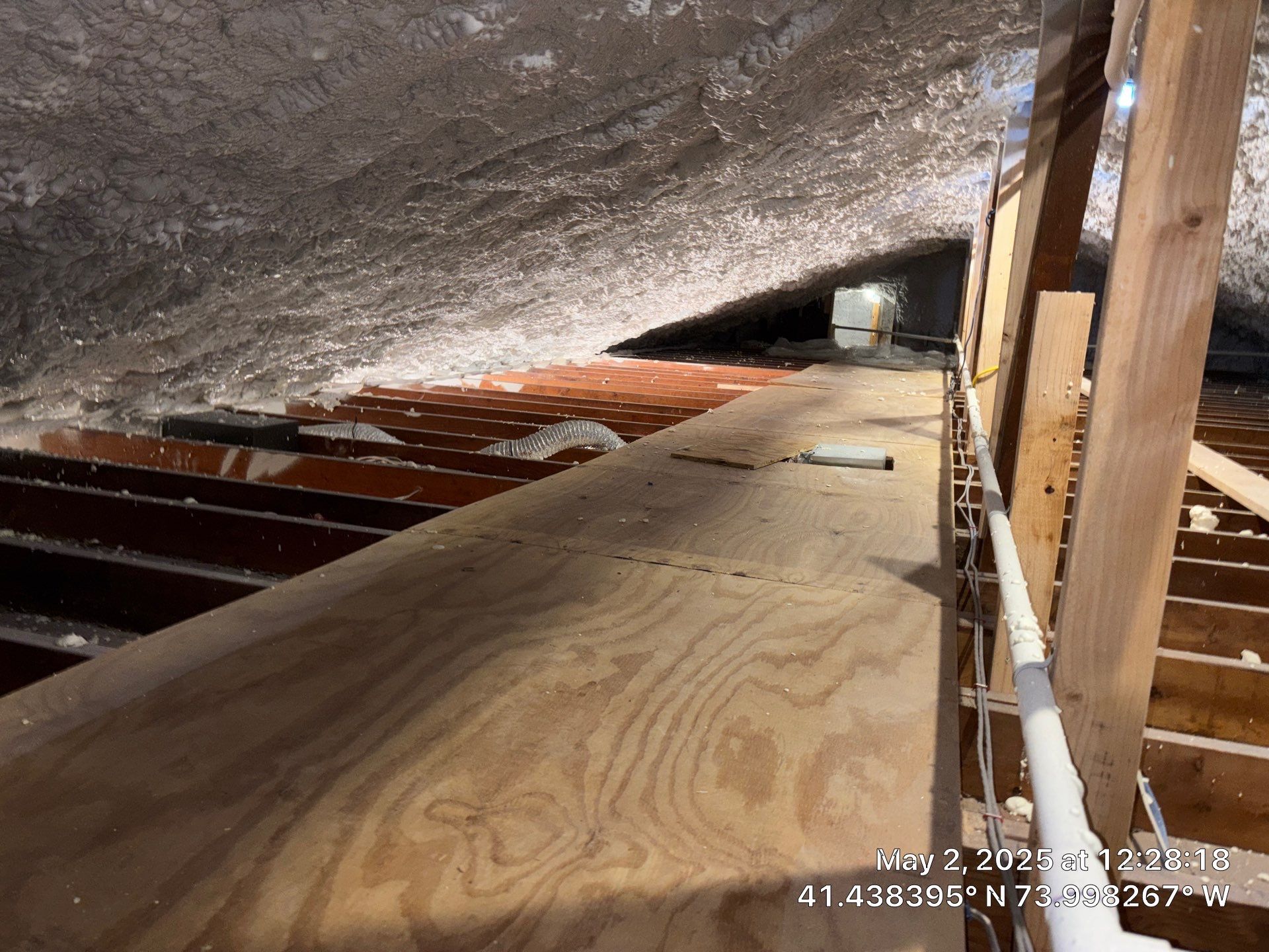 Attic Insulation using open cell spray foam by NYS Foam & Energy