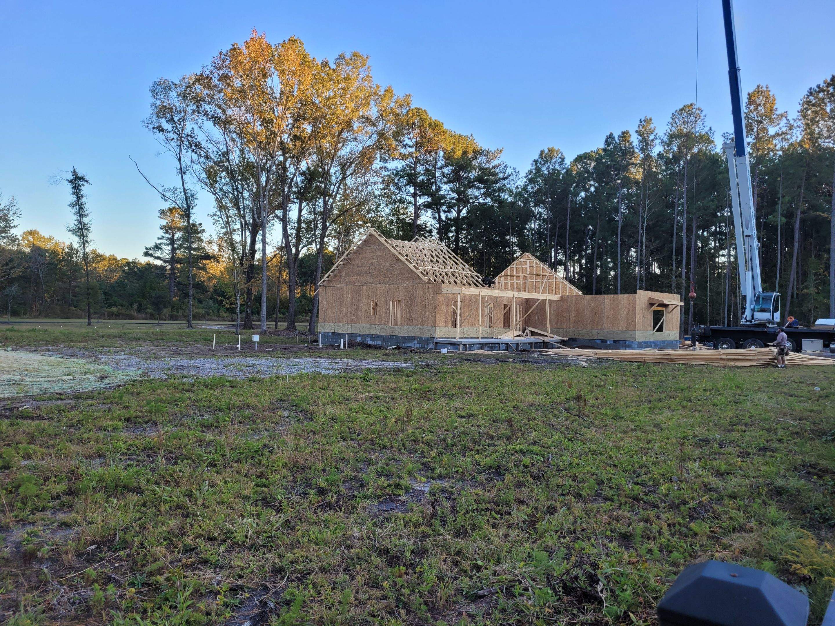 New Home Construction using brick and vertical vinyl by Cornerstone Home Builders, LLC