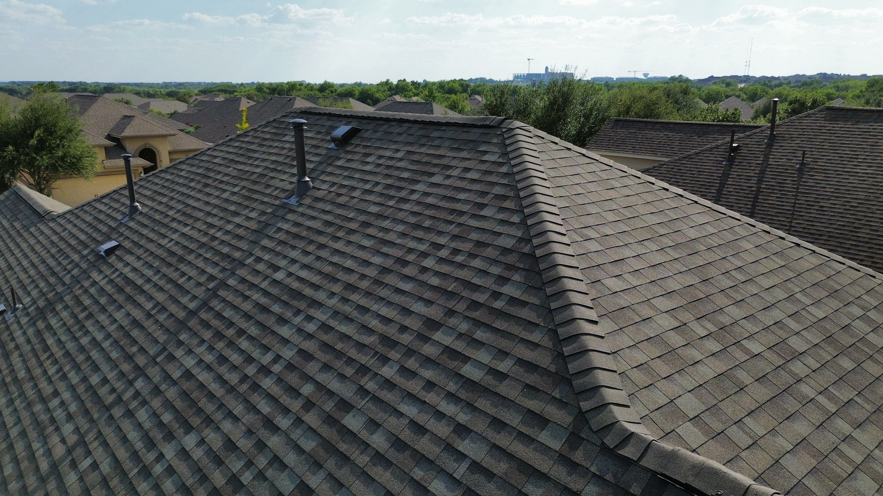 Full Roof Replacement with Solar Reinstall – Duration Driftwood | Round Rock, TX by Kstylez Roofing & Construction