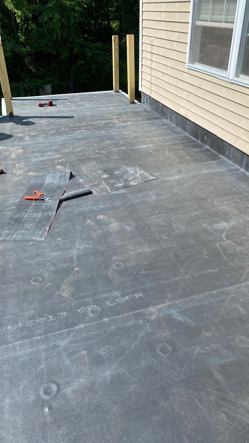 Siding Repair using Certainteed Mainsteet D4 and EPDM roof under deck by A Plus Exterior