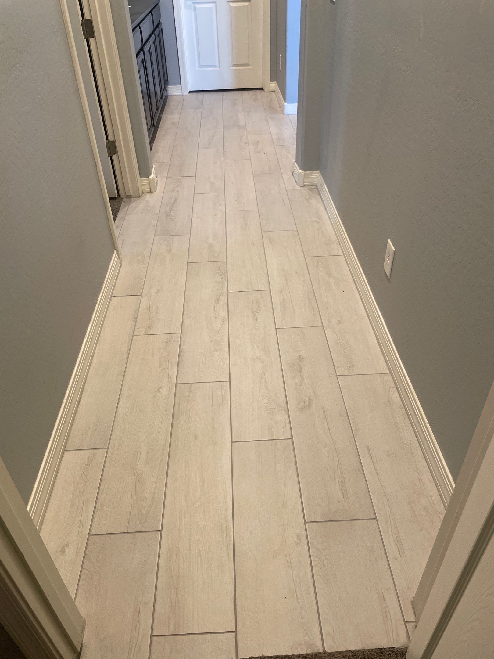 Wood Look Tile Floors and an Extra Large Shower  by Footprints Floors of Chandler 