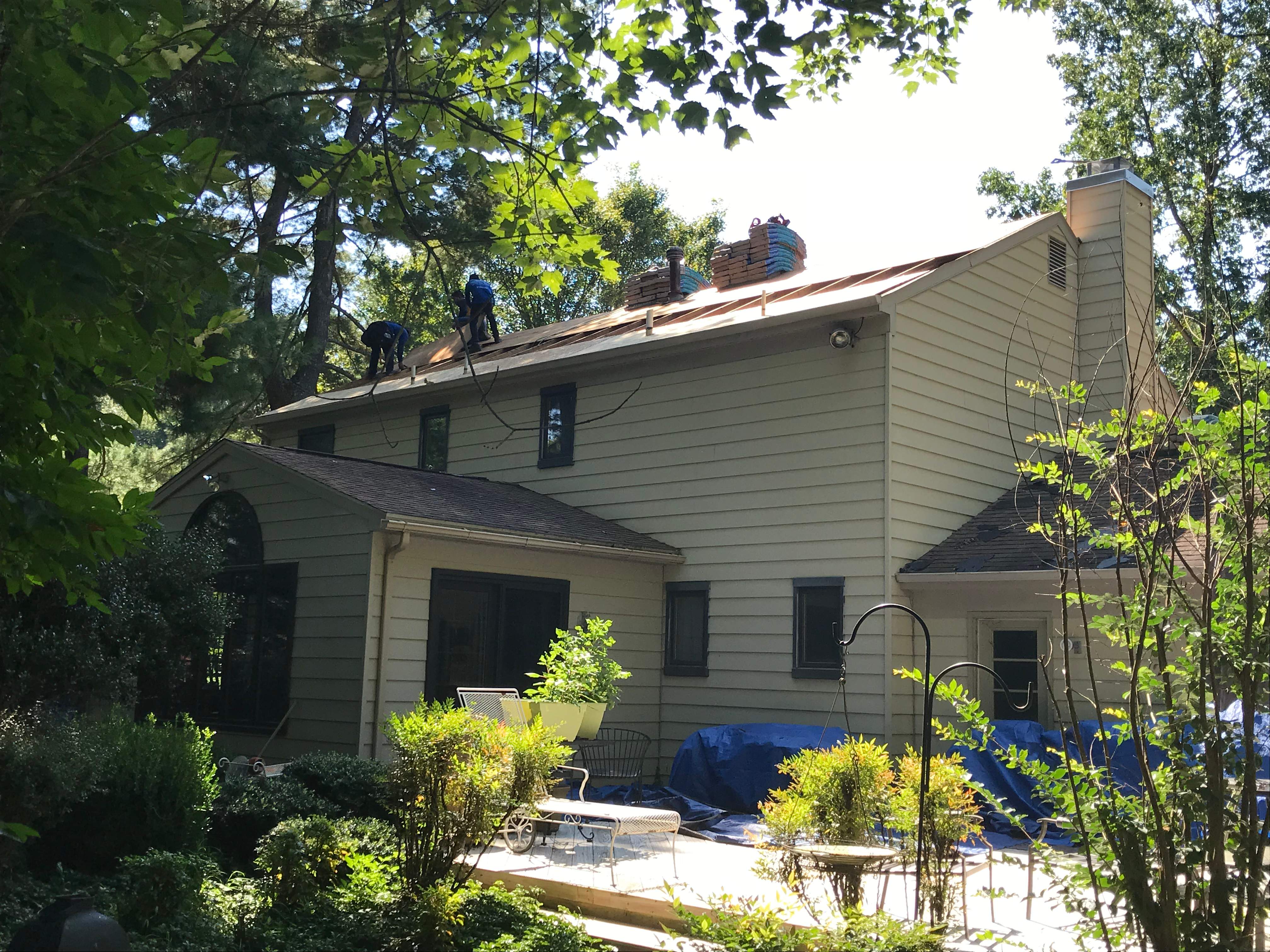 Residential Roofing Installation using Landmark Shingles Color Weatherwood by Alpha Design Services