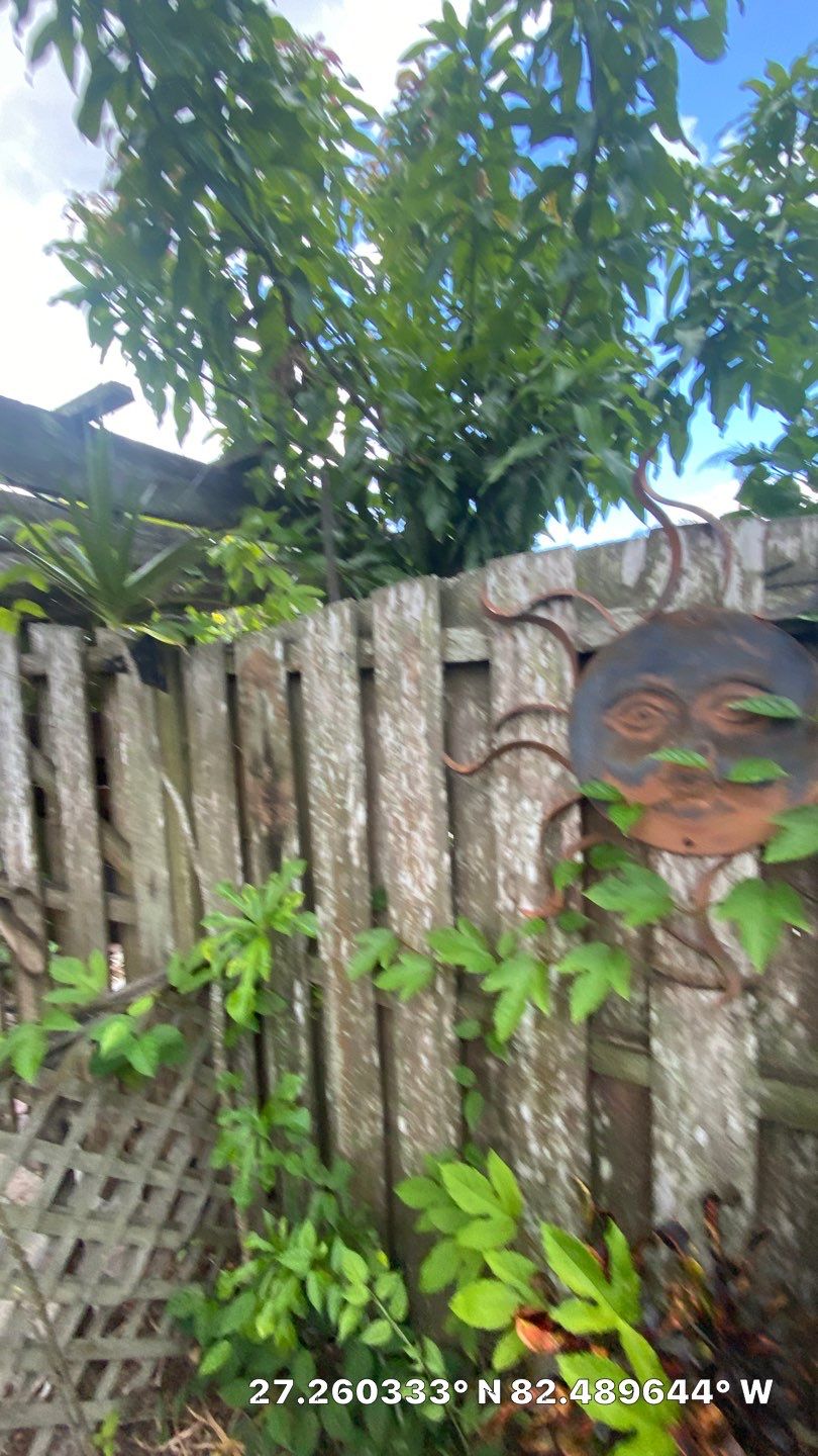Sarasota, FL 6ft. Tall Horizontal Shadowbox Wood with 4ft. Tall 3-Rail Black Aluminum Fence by Asap fence and gates, LLC