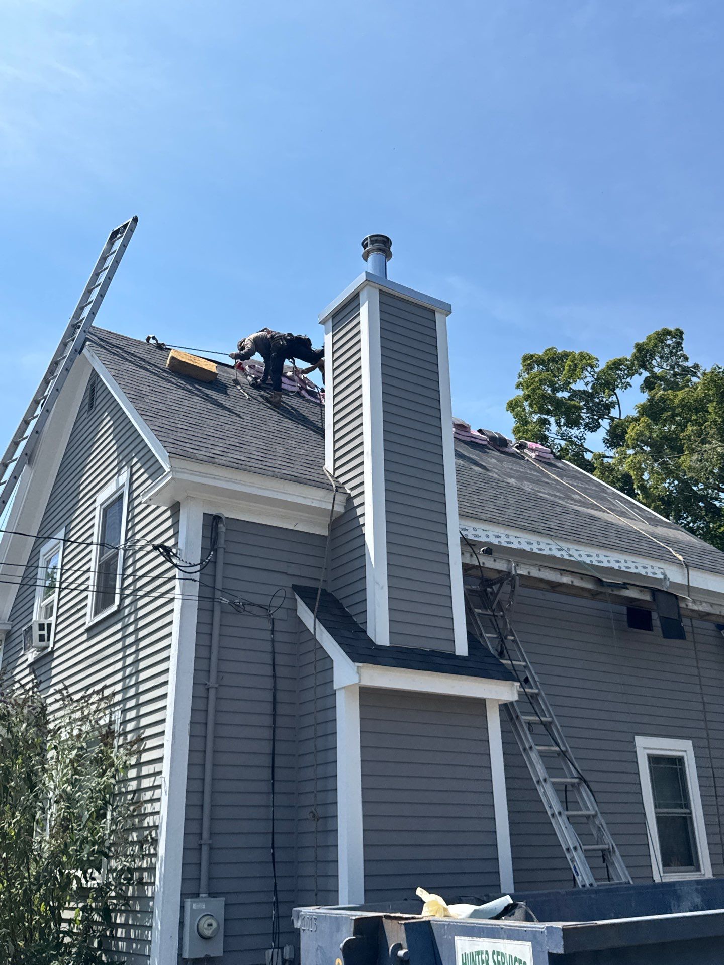 Full Roof Replacement + Custom Gutter Install | Onyx Black Finish by Mighty Dog Roofing of Greater Middlesex County