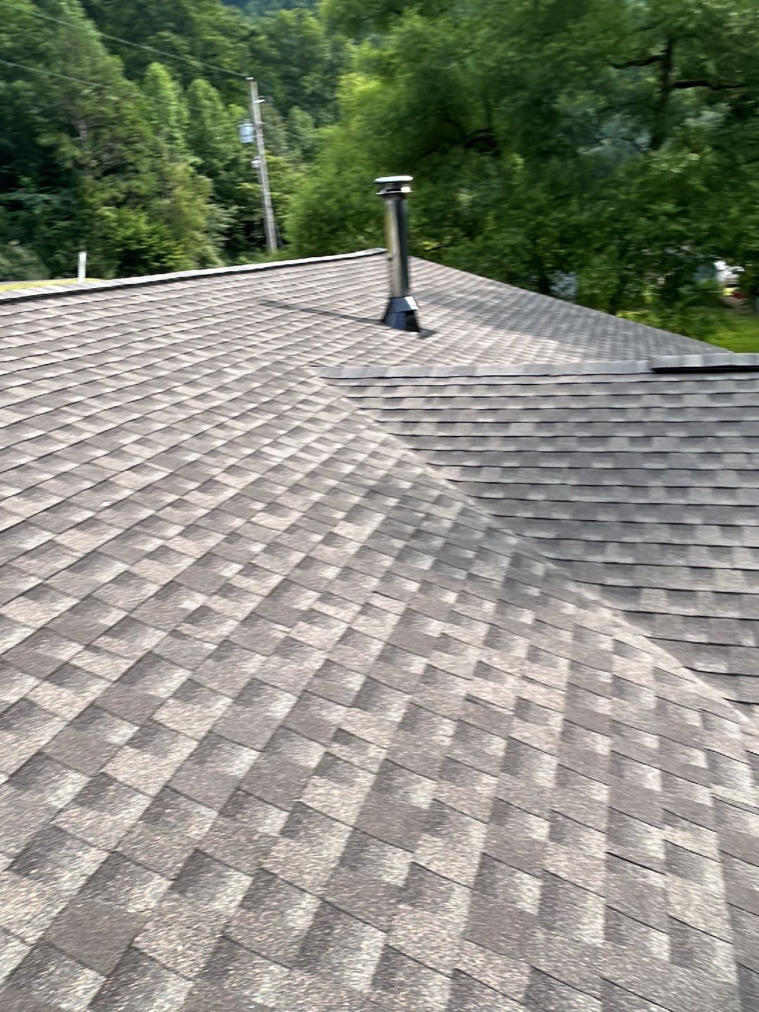 Residential Roofing Installation using Performance Shingles by Mr. Roofer