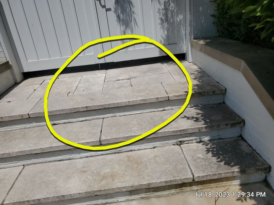marble patio cleaning and sanding using Polysweep polymeric sand by Northern Power Washing LLC.