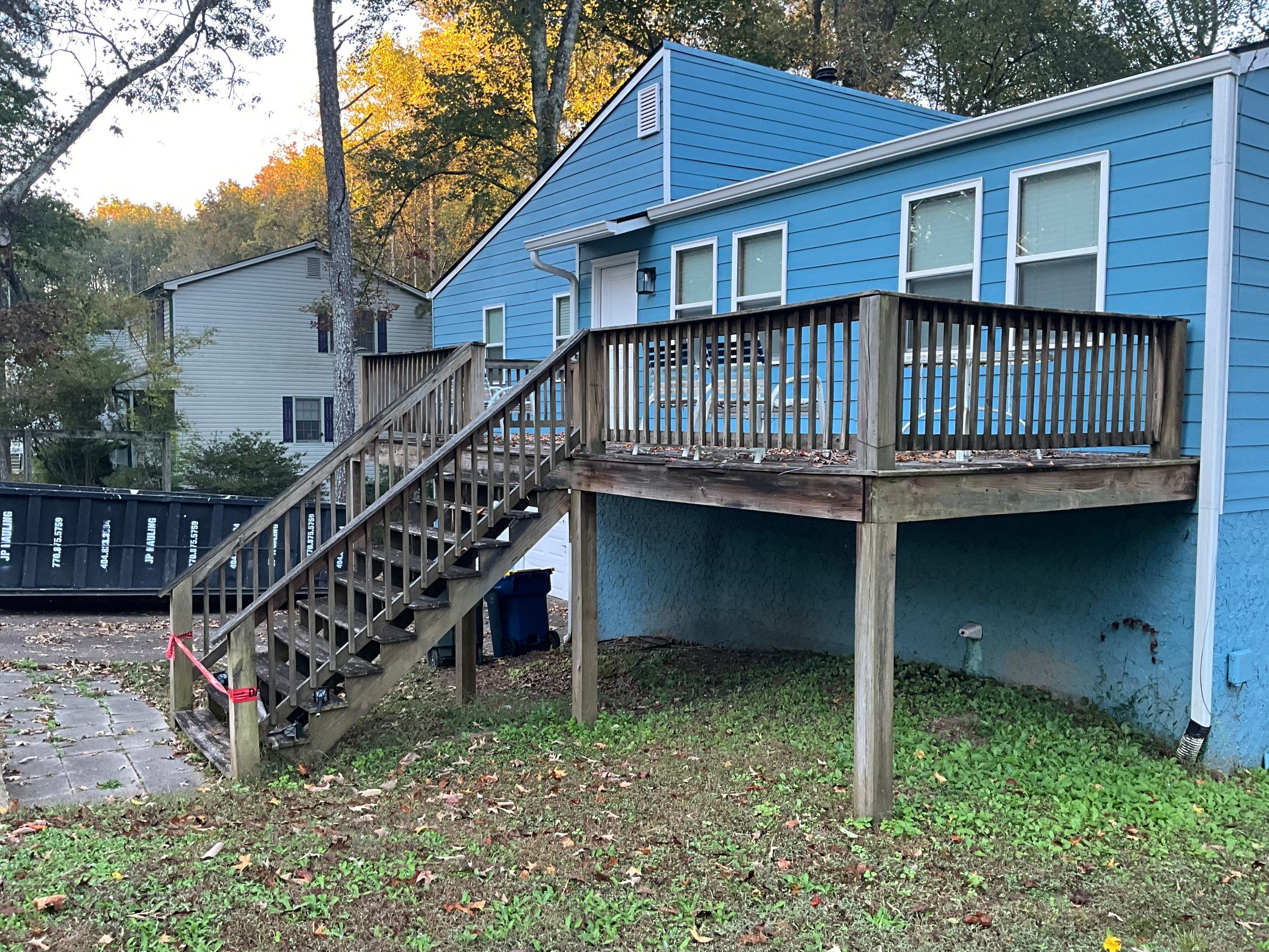 Custom Pressure-Treated Wood Staircase and Landing Installation by Swift Home Renovations