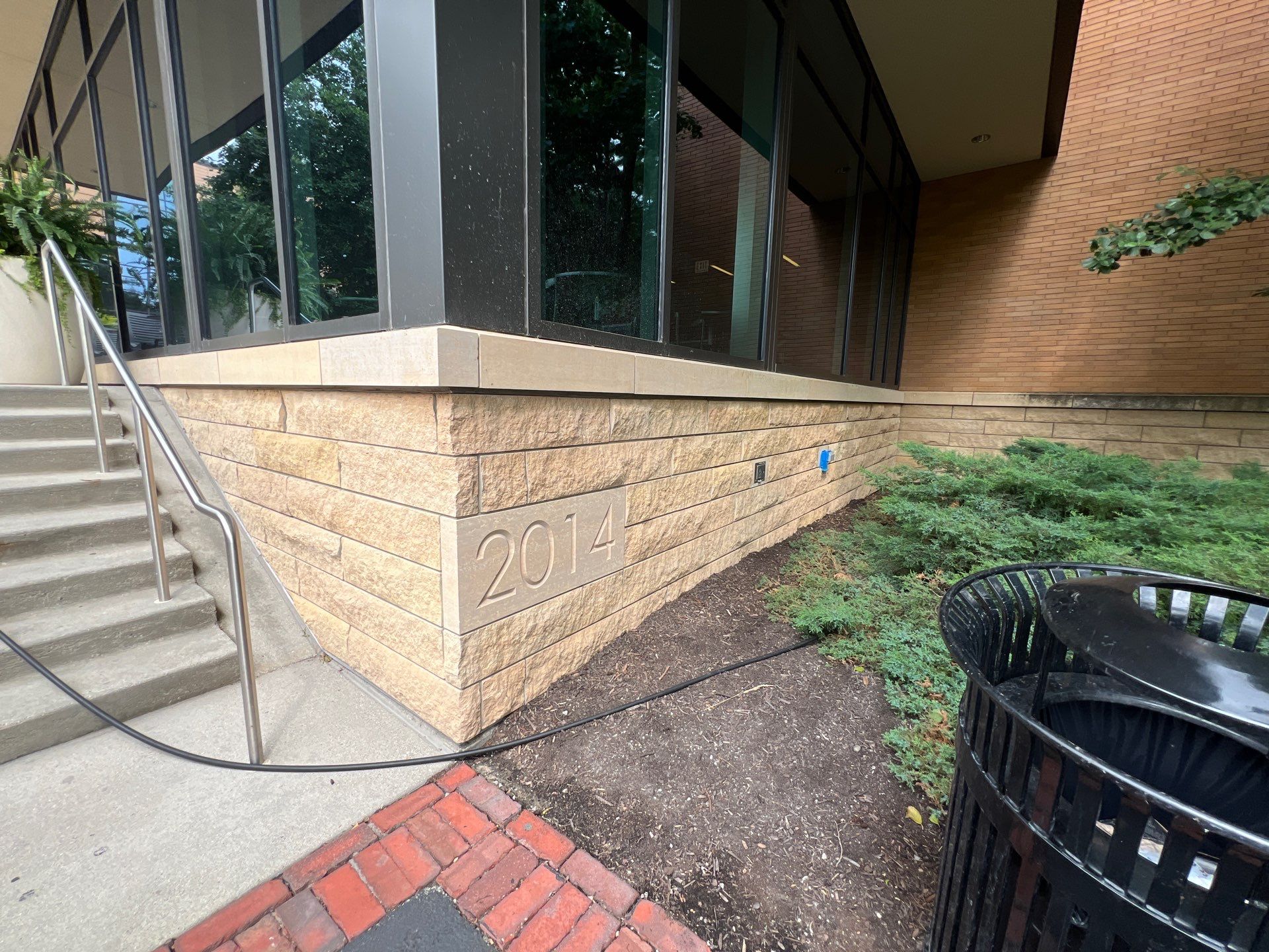 natural stone using Algaecide, soft wash soap by Northern Power Washing LLC.