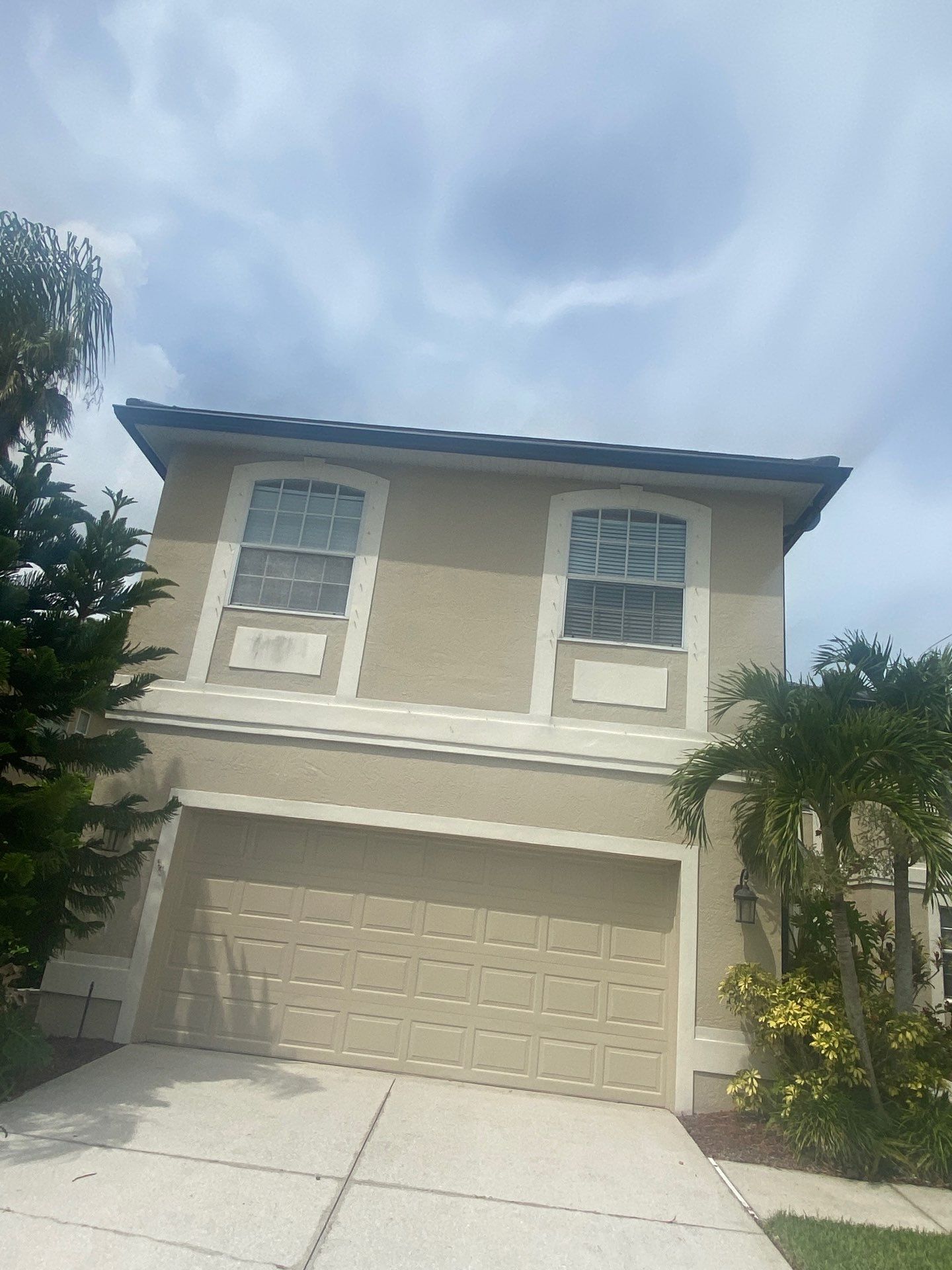 Black Seamless Gutters for Modern Homes in Osprey FL by Gutter Professors