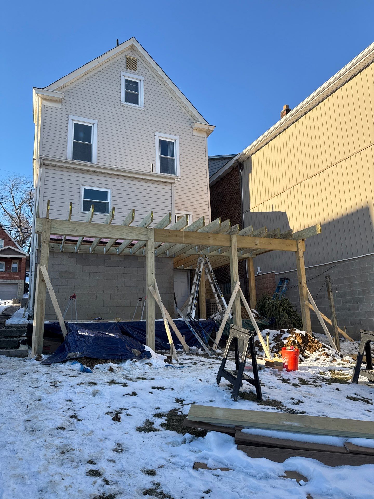 Deck and door by Cousins Roofing Siding & Decks