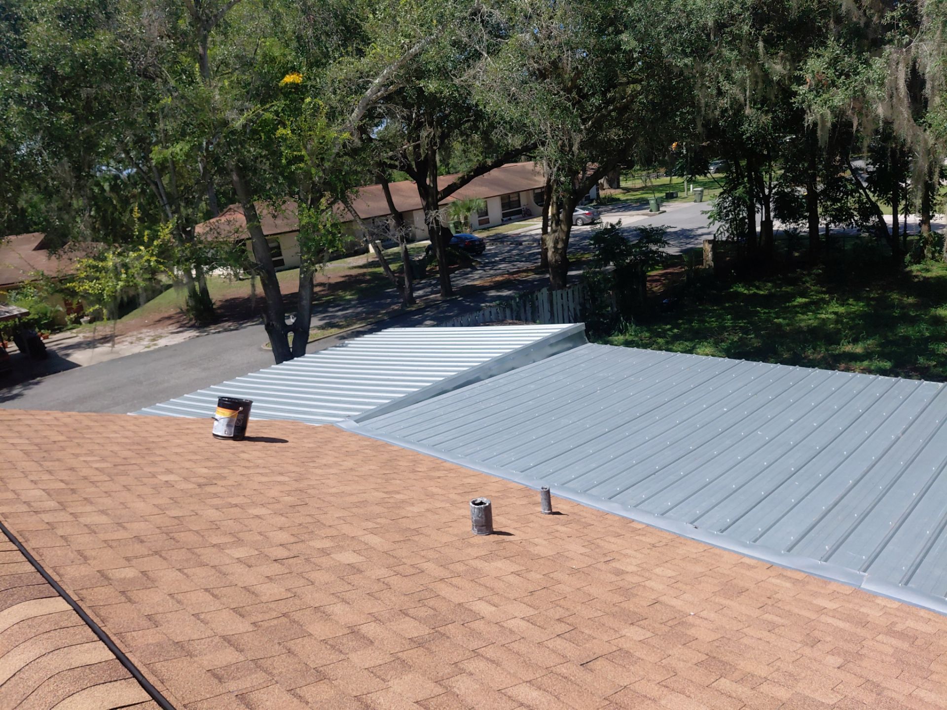 Combined Shingle and Metal Residential Roof Replacement in Leesburg Florida by Pinnacle Roofing Group