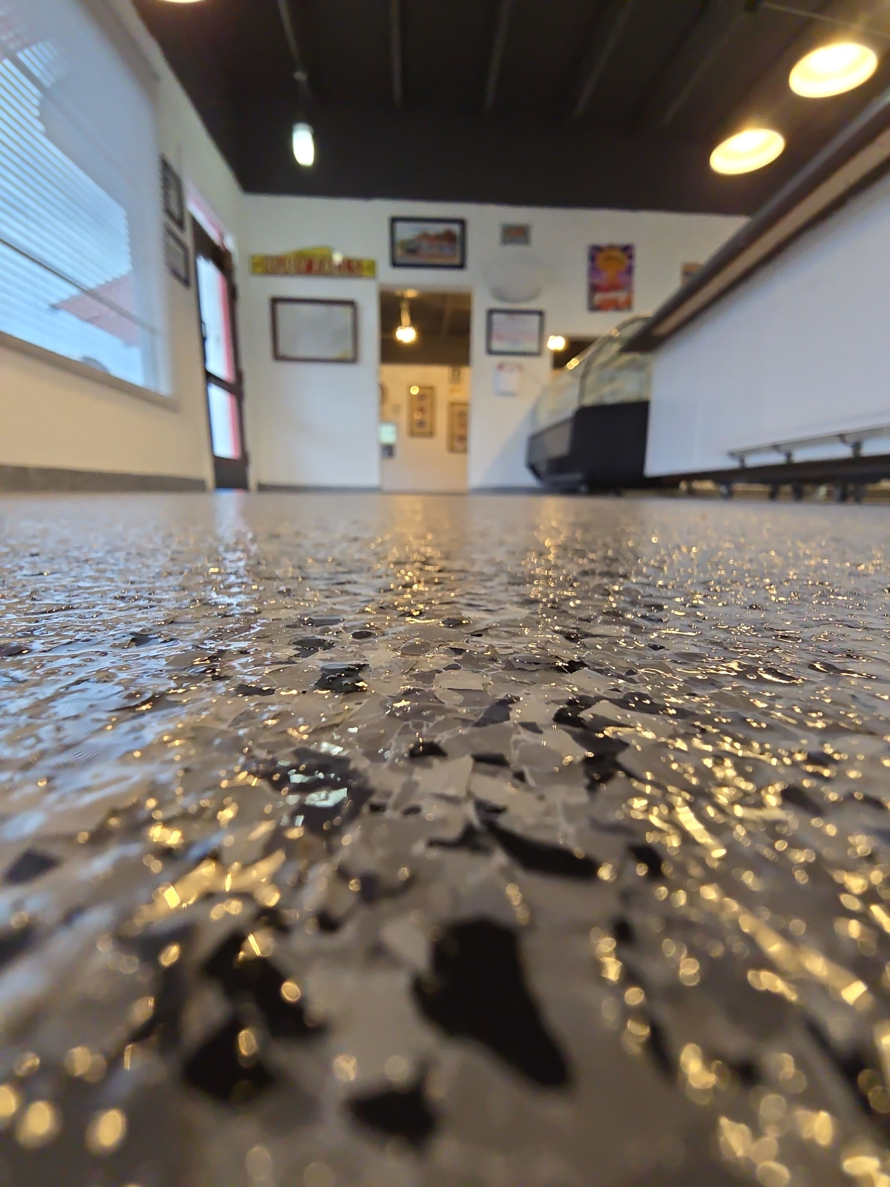 Check it out! Steelwheel Corner gets a new floor! by Elite Floor Solutions