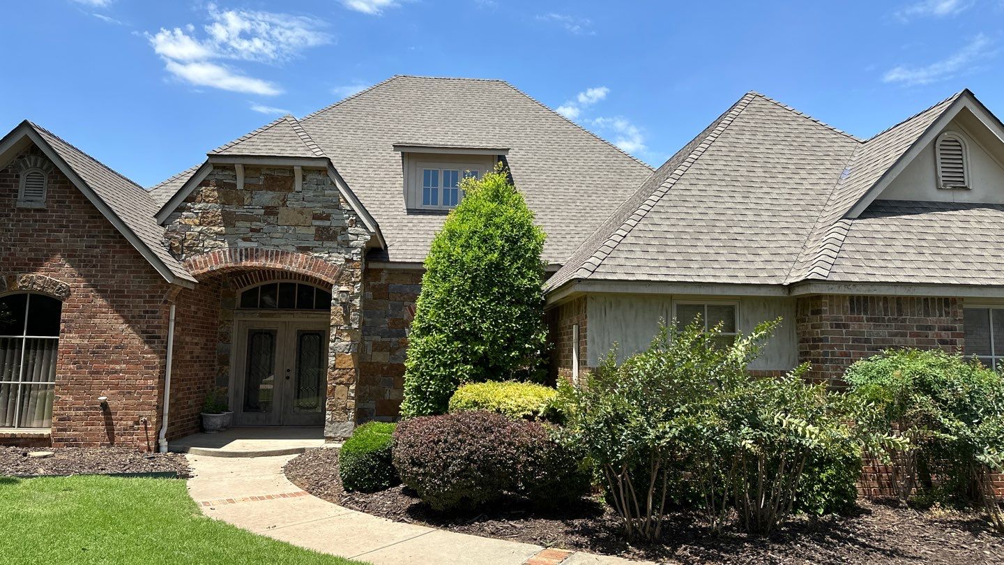 Roof Replacement and Gutter Installation in Edmond, OK by McCann's Roofing and Construction