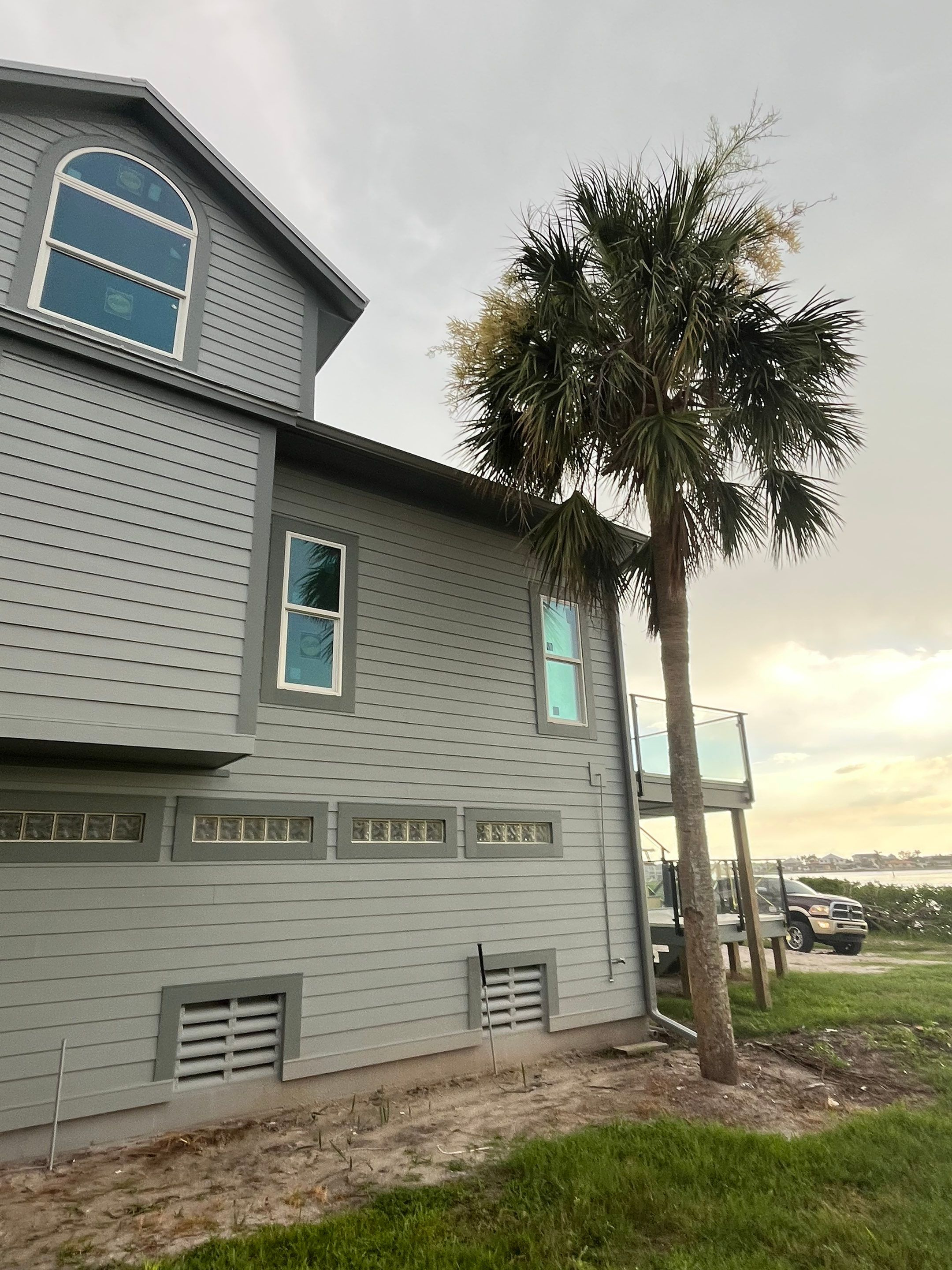 Downspout Installation Dove Grey Palmetto FL by Gutter Professors