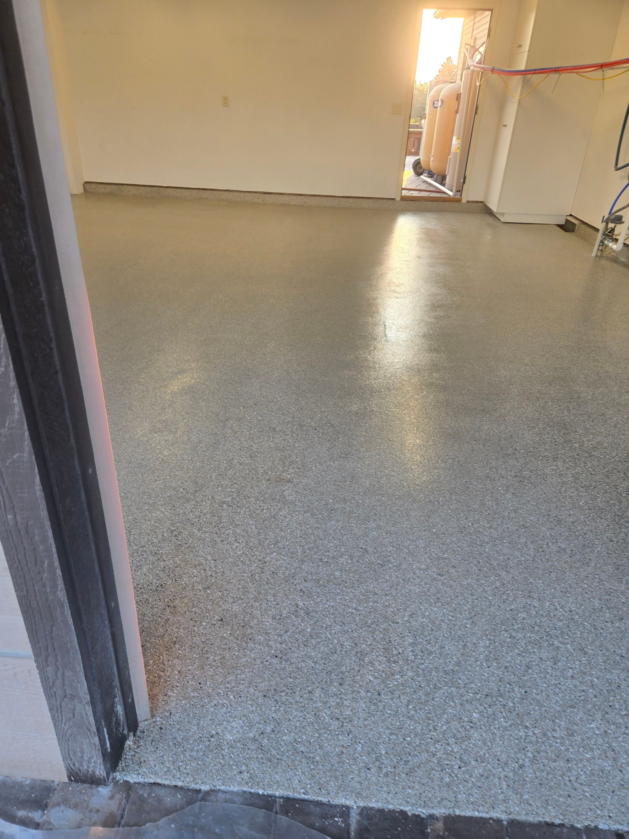 Garage Transformation using Quartzite Hybrid by Croc Coatings, LLC