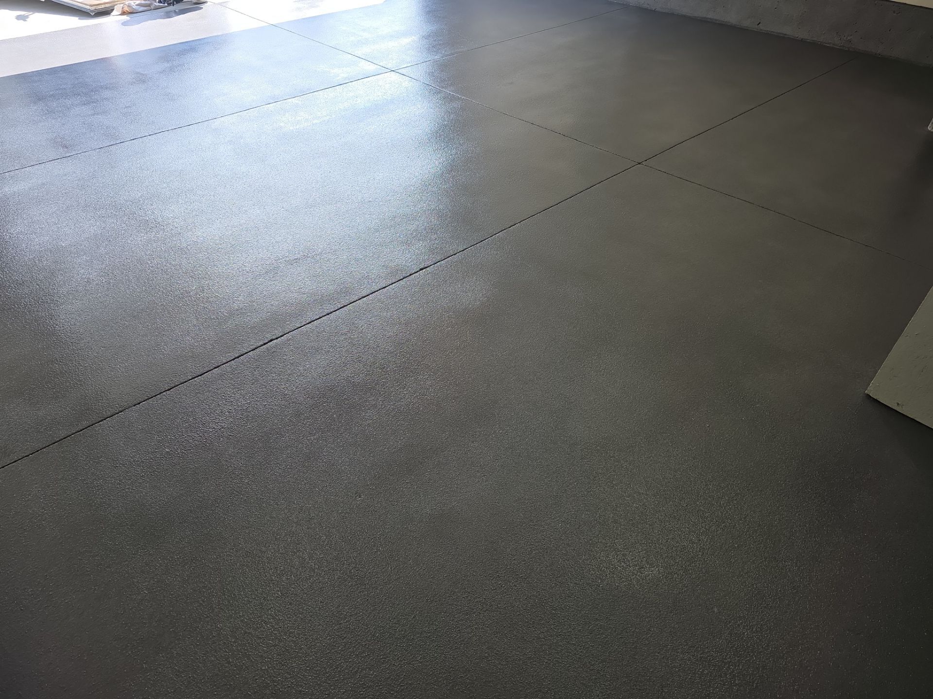 Garage Transformation using Battleship Hybrid by Croc Coatings, LLC
