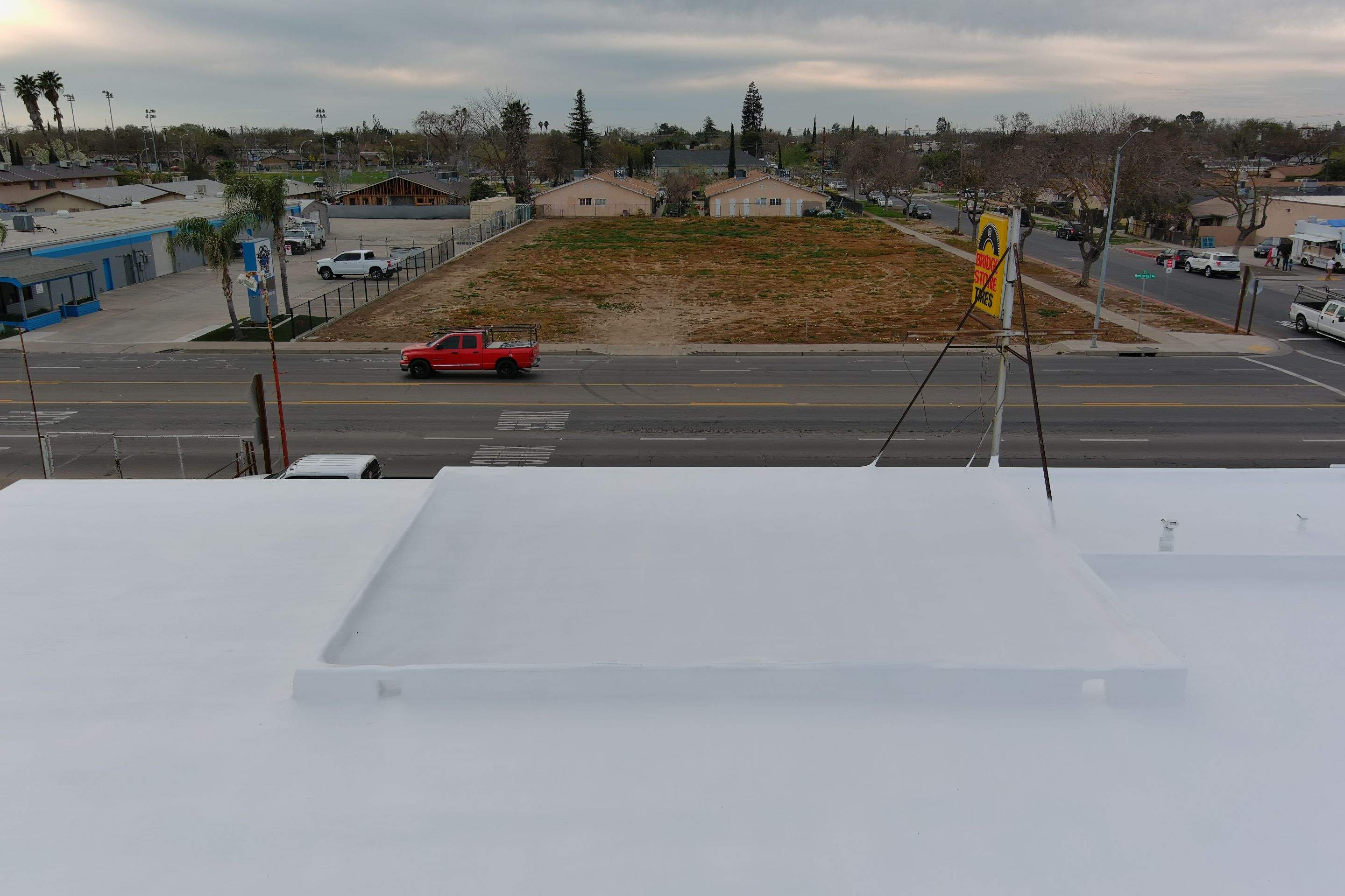 Spray foam and coatings using Conklin Benchmark/PUMA XL coatings and spray foam by Straight Edge Roofing Inc