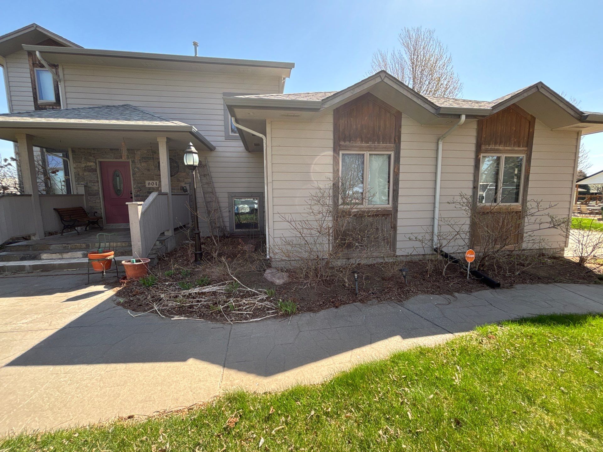 Exterior Siding and Trim Painting for Sioux Falls Residence by Select Painting, Coatings & Garage Cabinets