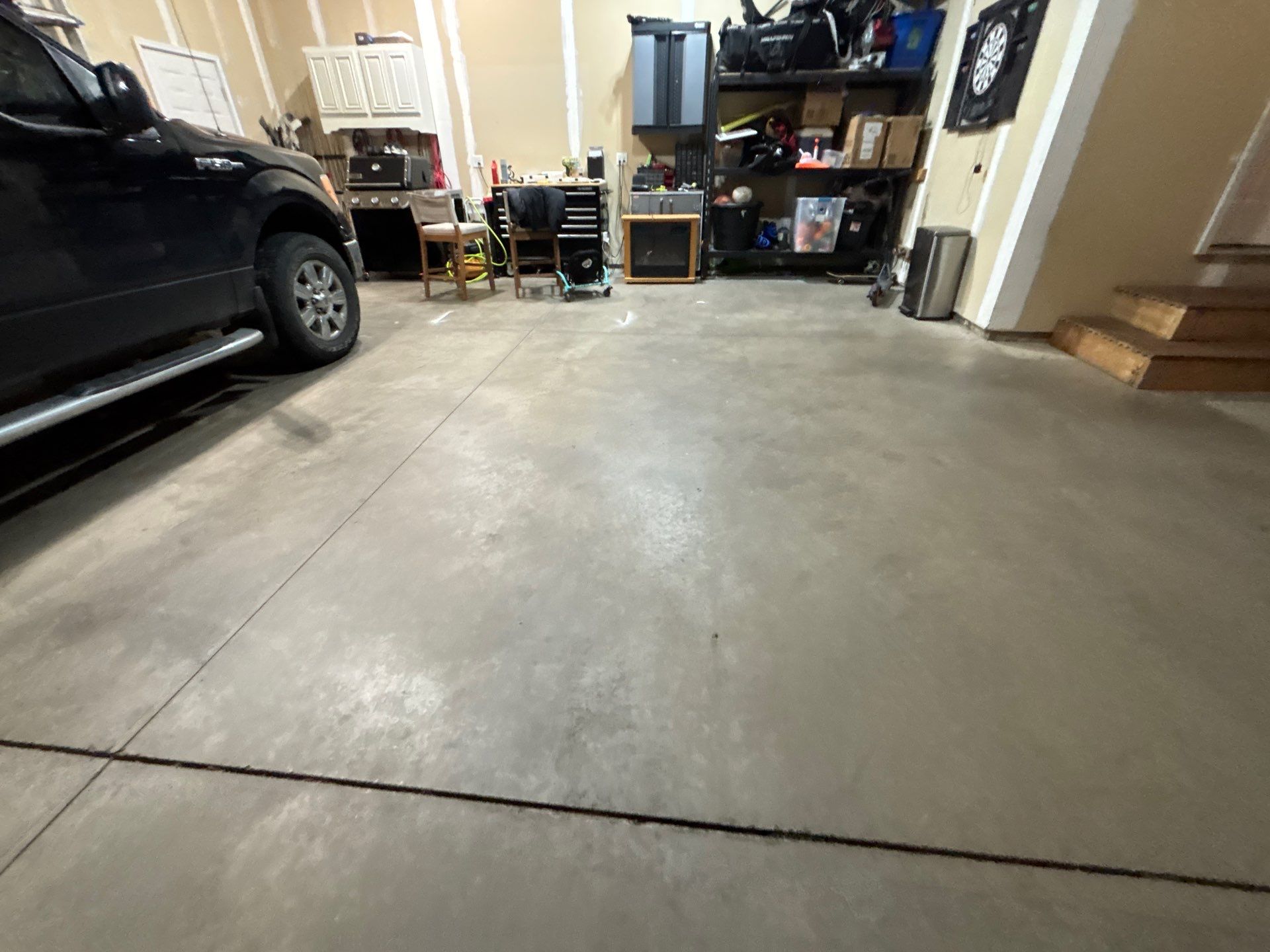 Full Garage Floor Resurfacing and Decorative Epoxy Flake Finish by Select Painting, Coatings & Garage Cabinets