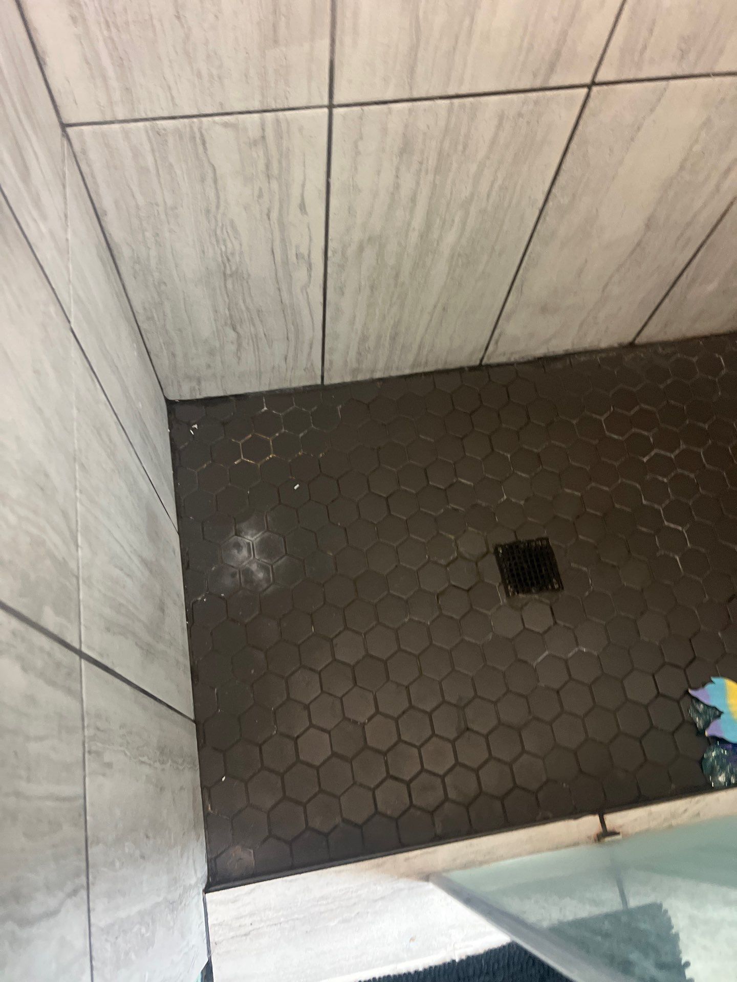 Tile out, Bella Stone in! by The Shower Company