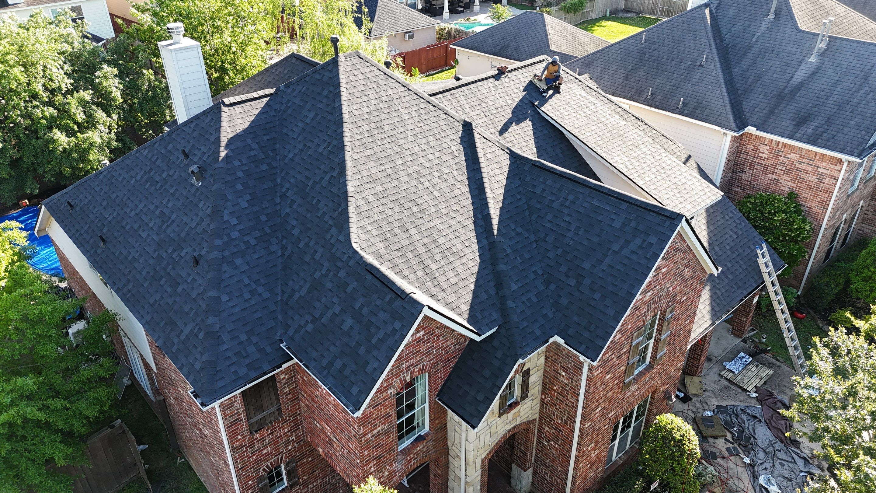Residential Roofing Installation using Architectural Shingles by Core Four Roofing