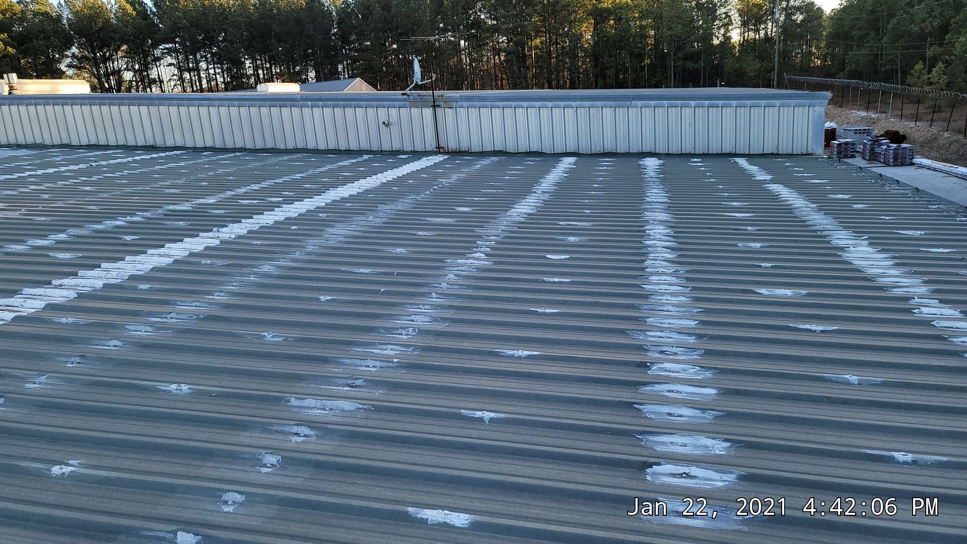 Commercial Roofing Installation using Aldocoat Coatings by Hostetler Roofing
