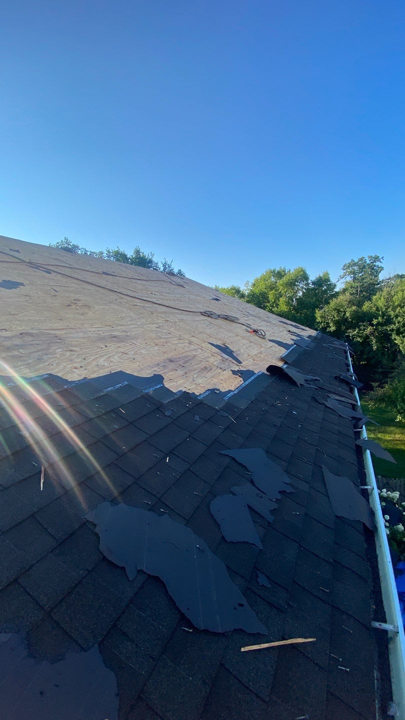 Asphalt Roof Replacement by Custom Installations