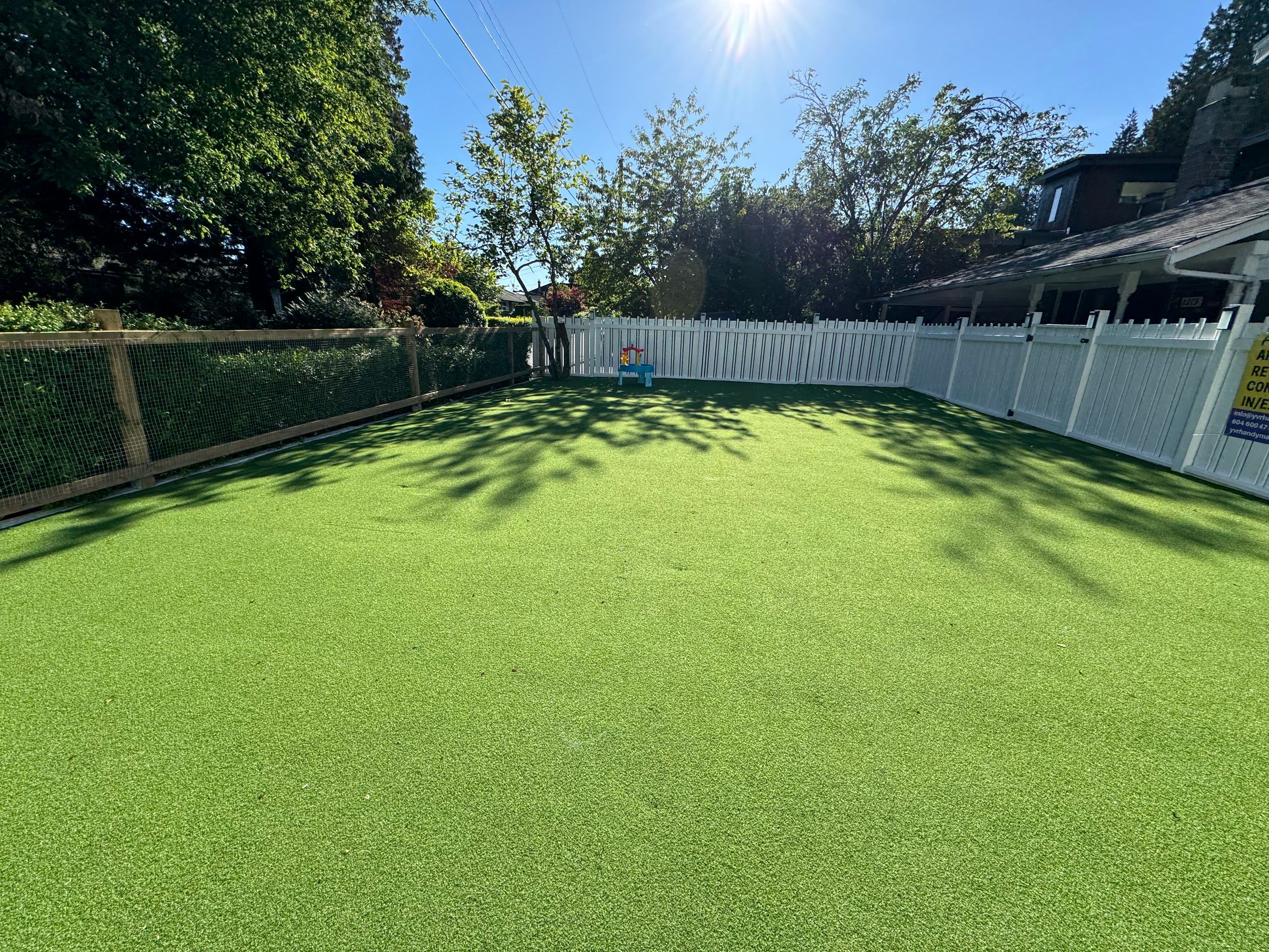 Artificial Grass and Custom Fence For KidiKare Daycare by YVR Construction Group