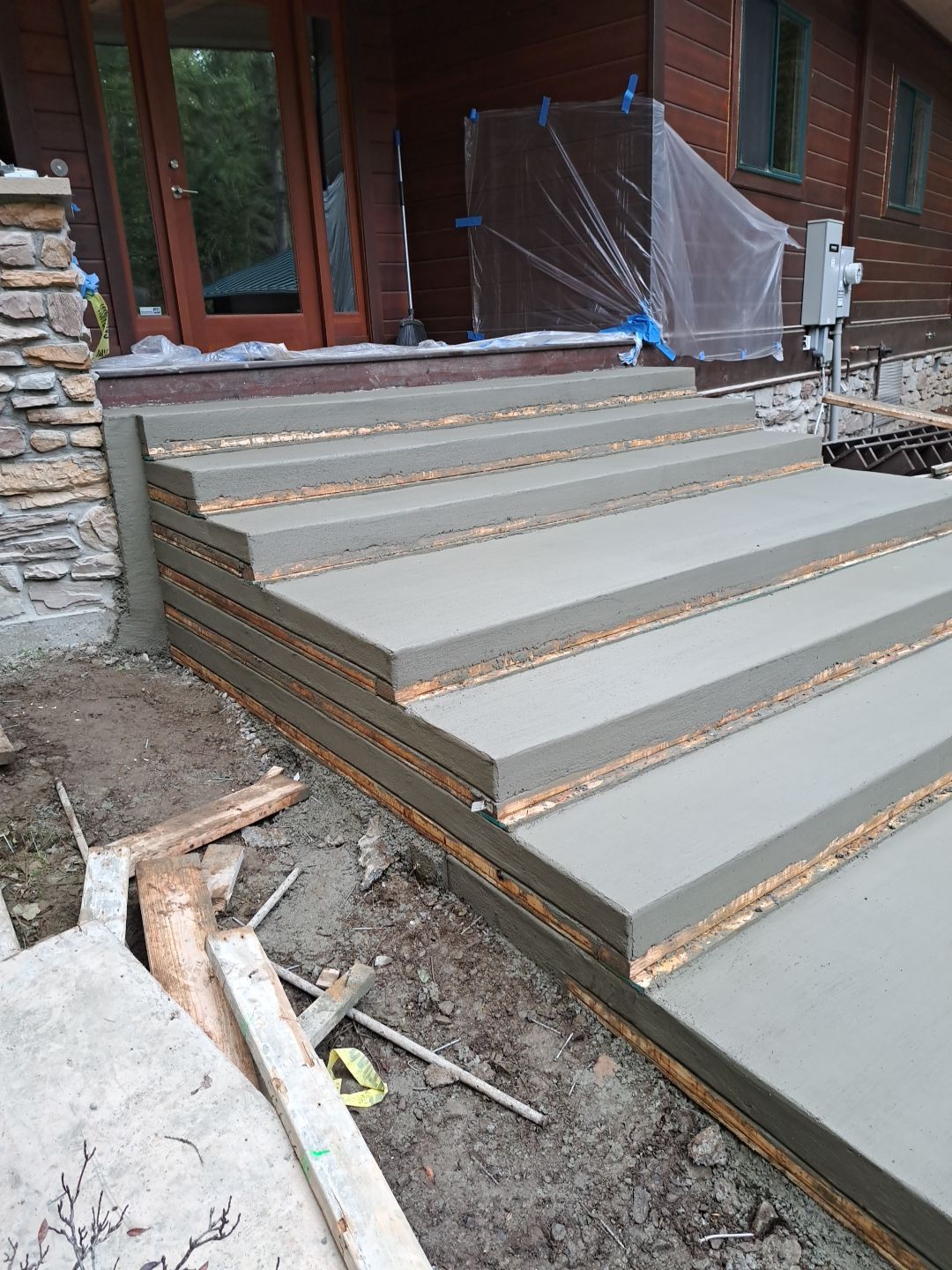 Pia | Custom Concrete Driveway, Walkway & Floating Steps by Jireh Asphalt & Concrete Inc 