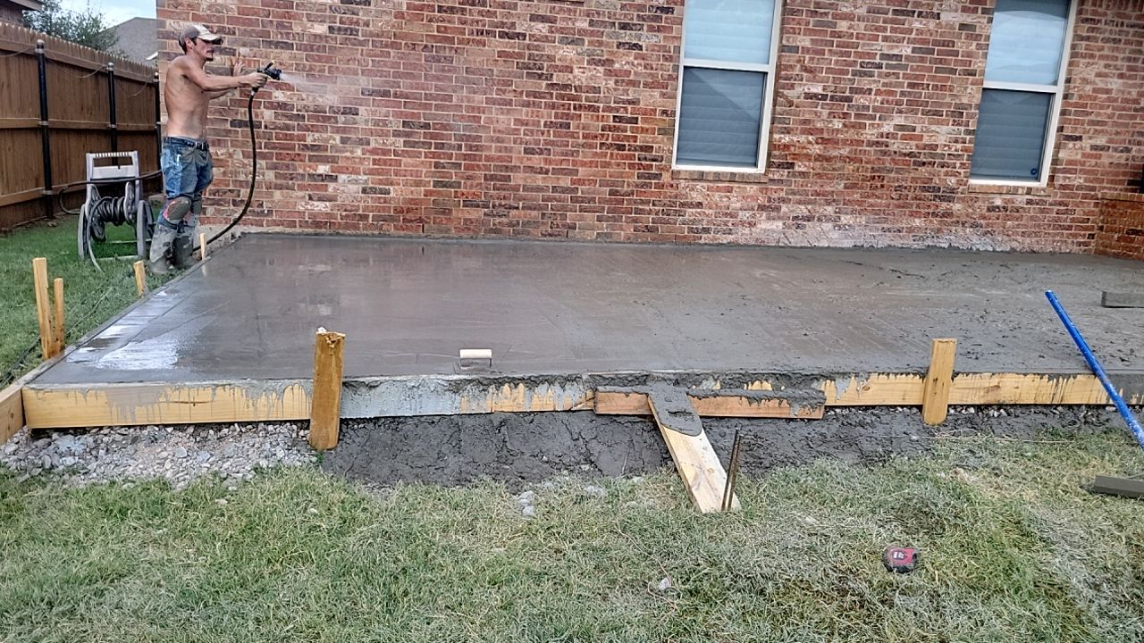 Concrete slab with Pergola by Clays Services Inc