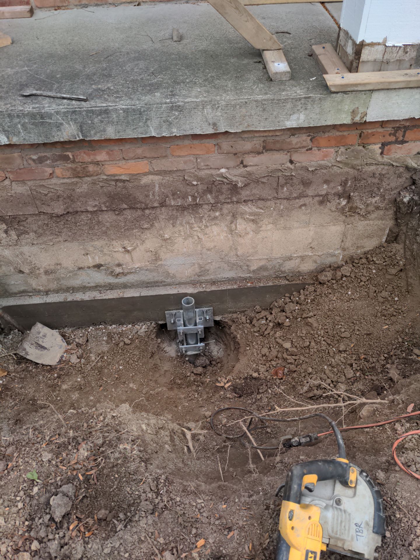 Helical Piers and Pillar Lift using Helical Foundation Footings by Toledo Basement Repair